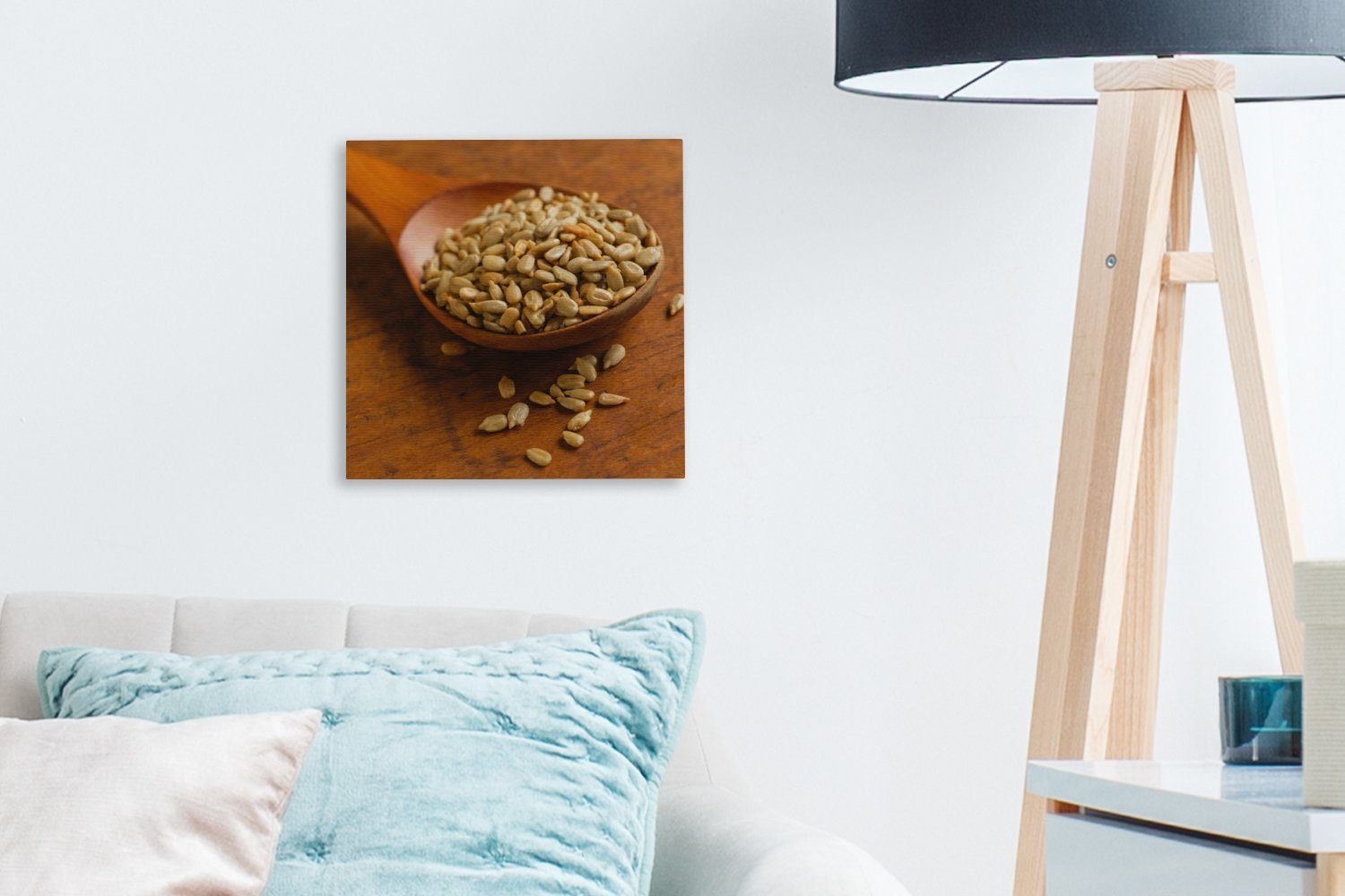 Holztisch, Bilder Leinwandbild Sonnenblumenkernen Schlafzimmer OneMillionCanvasses® für voll St), Wohnzimmer Leinwand auf (1 mit Holzlöffel einem