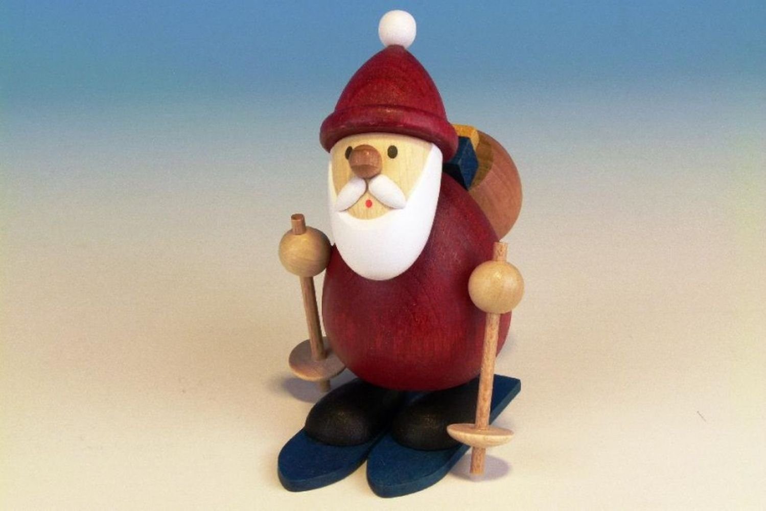 Ullrich Kunsthandwerk Weihnachtsfigur Holzfigur Weihnachtsmann auf Ski HxBxT 9,6x7x9,5cm NEU