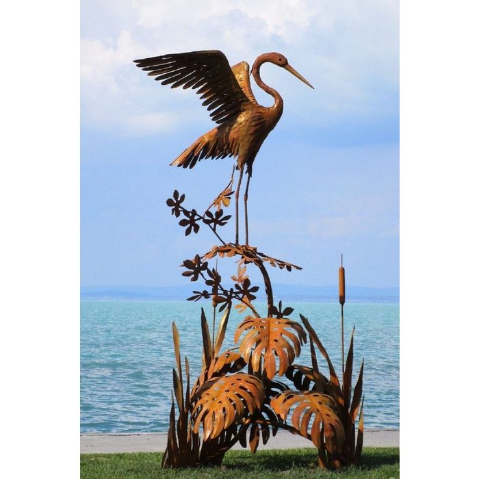 Casa Padrino Skulptur Luxus Stahl Garten Skulptur Reiher auf Ast Rostfarben 103 x 108 x H. 218 cm - Handgefertigte Garten Deko Figur - Luxus Garten Dekoration