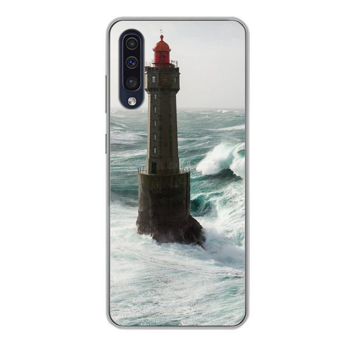 MuchoWow Handyhülle Eine Welle hinter dem Leuchtturm von La Jument in Frankreich Handyhülle Samsung Galaxy A50 Smartphone-Bumper Print Handy