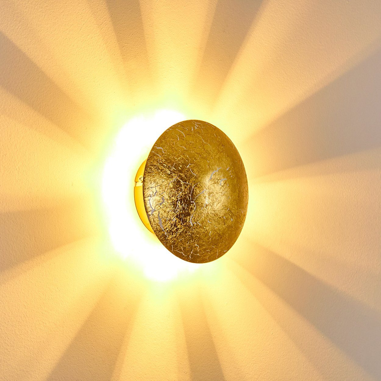 hofstein Wandleuchte »Godo« Wandlampe runde aus Metall in Gold mit Lichtspiel an der Wand, ohne Leuchtmittel, 1xG9, Innen mit Strahlen-Effekt in Blattgold-Optik
