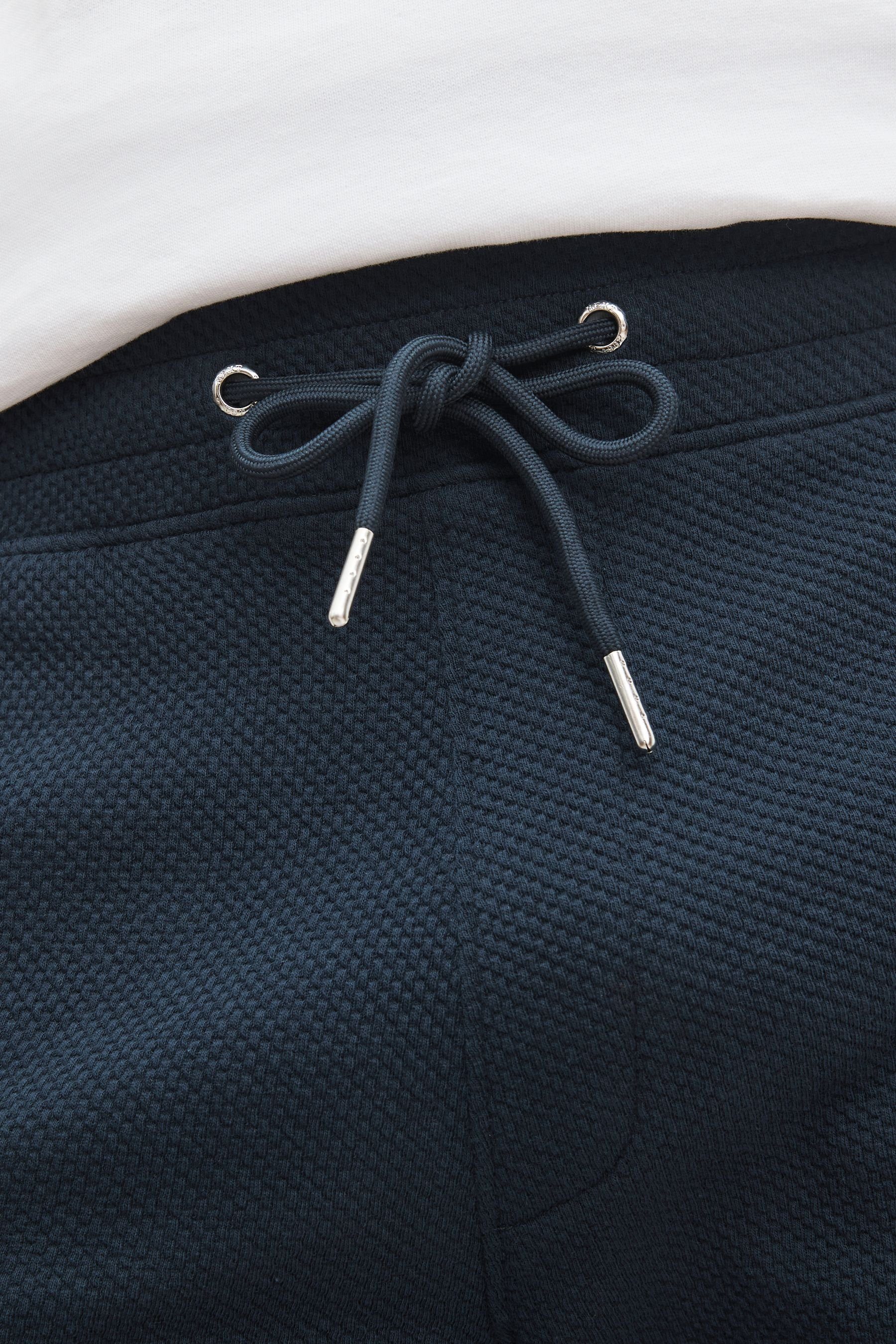 Next Sweatshorts Jersey-Shorts Blue strukturiertem aus (1-tlg) Navy Material