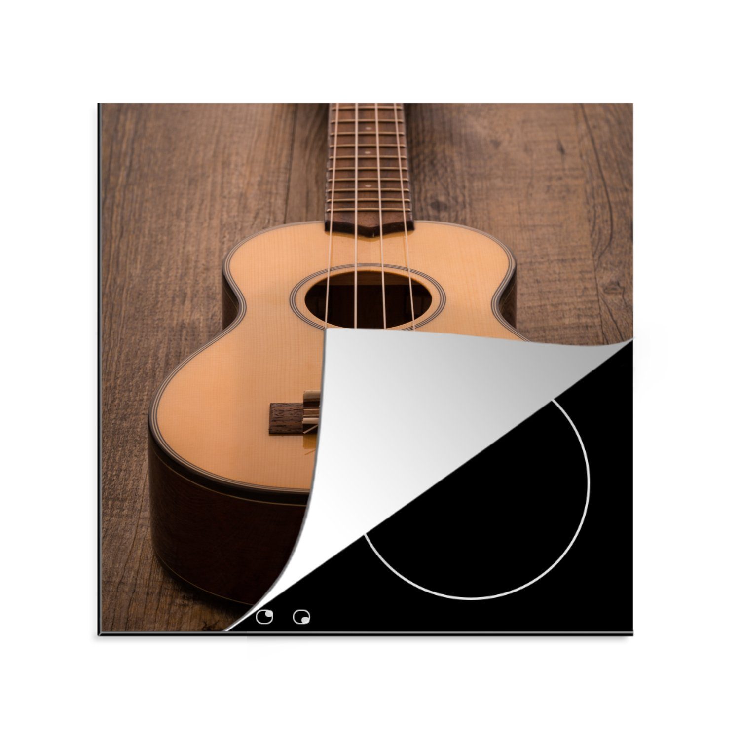 MuchoWow Herdblende-/Abdeckplatte Akustische Gitarre auf einem Holztisch, Vinyl, (1 tlg), 78x78 cm, Ceranfeldabdeckung, Arbeitsplatte für küche