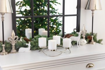EDZARD Adventskranz Alva, (33 cm) Kerzenhalter für Stumpenkerzen, Adventsleuchter als Weihnachtsdeko für 4 Kerzen á Ø 8 cm, Kerzenkranz als Tischdeko mit Silber-Optik, vernickelt