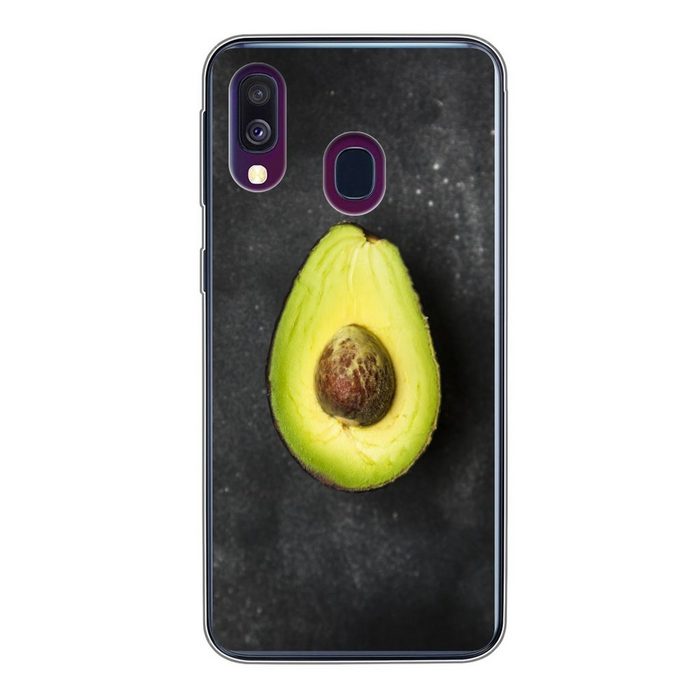 MuchoWow Handyhülle Einsame Avocado auf einem schwarzen Tisch Handyhülle Samsung Galaxy A40 Smartphone-Bumper Print Handy