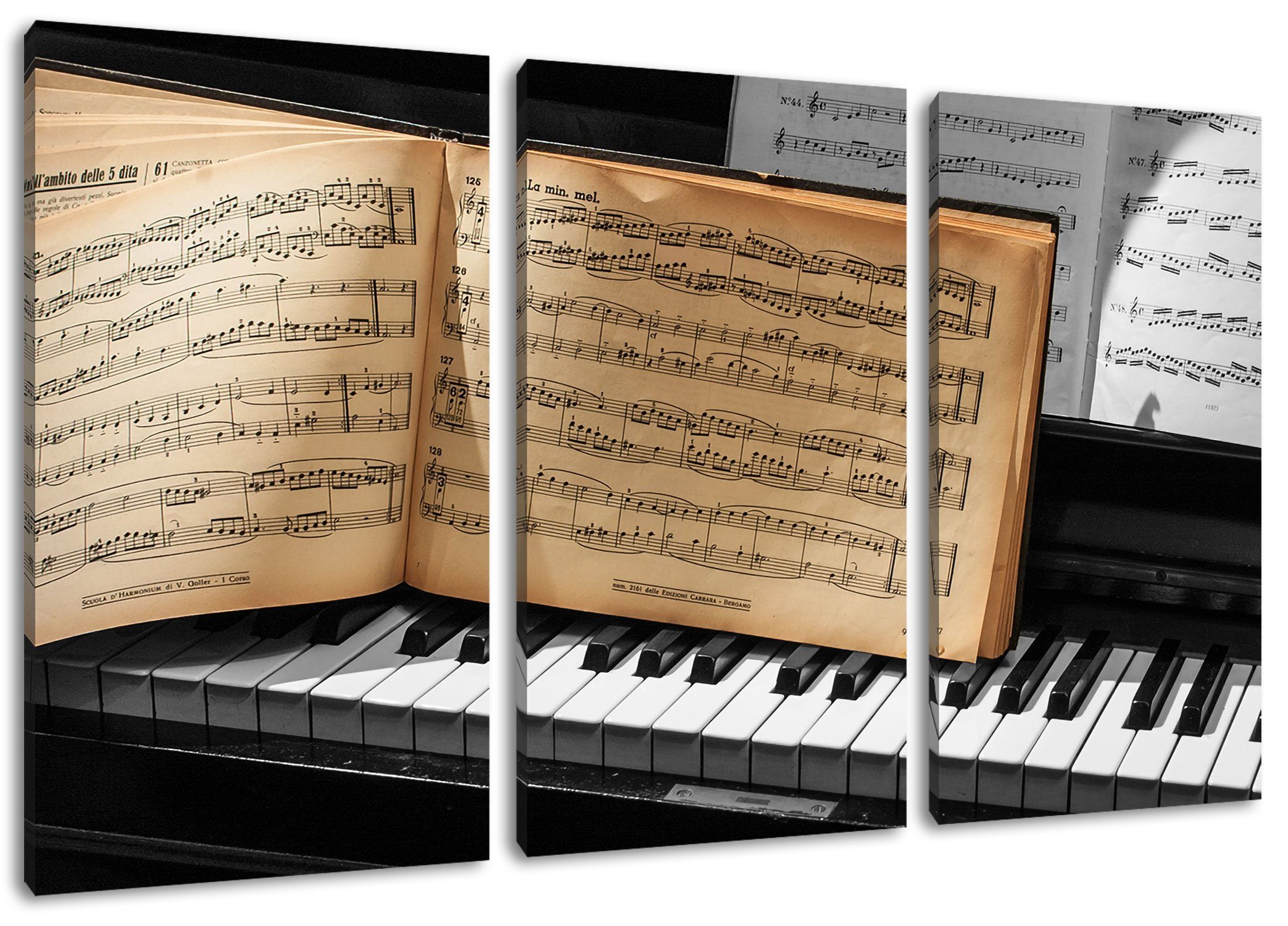Leinwandbild Notenbuch auf Piano