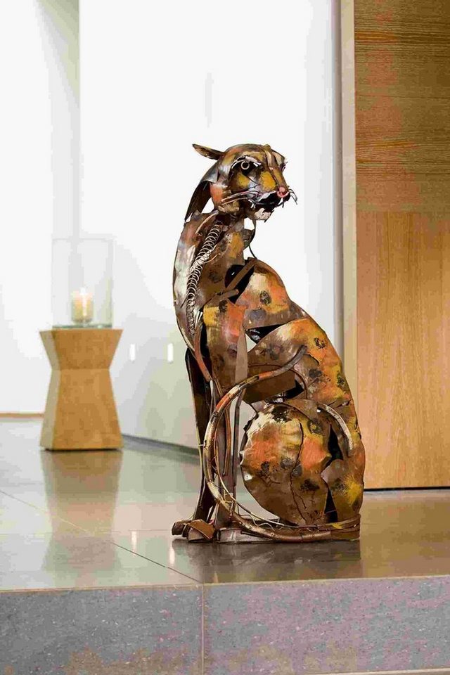 GILDE Dekofigur Gilde Metall Skulptur Serengeti Hunter sitzend