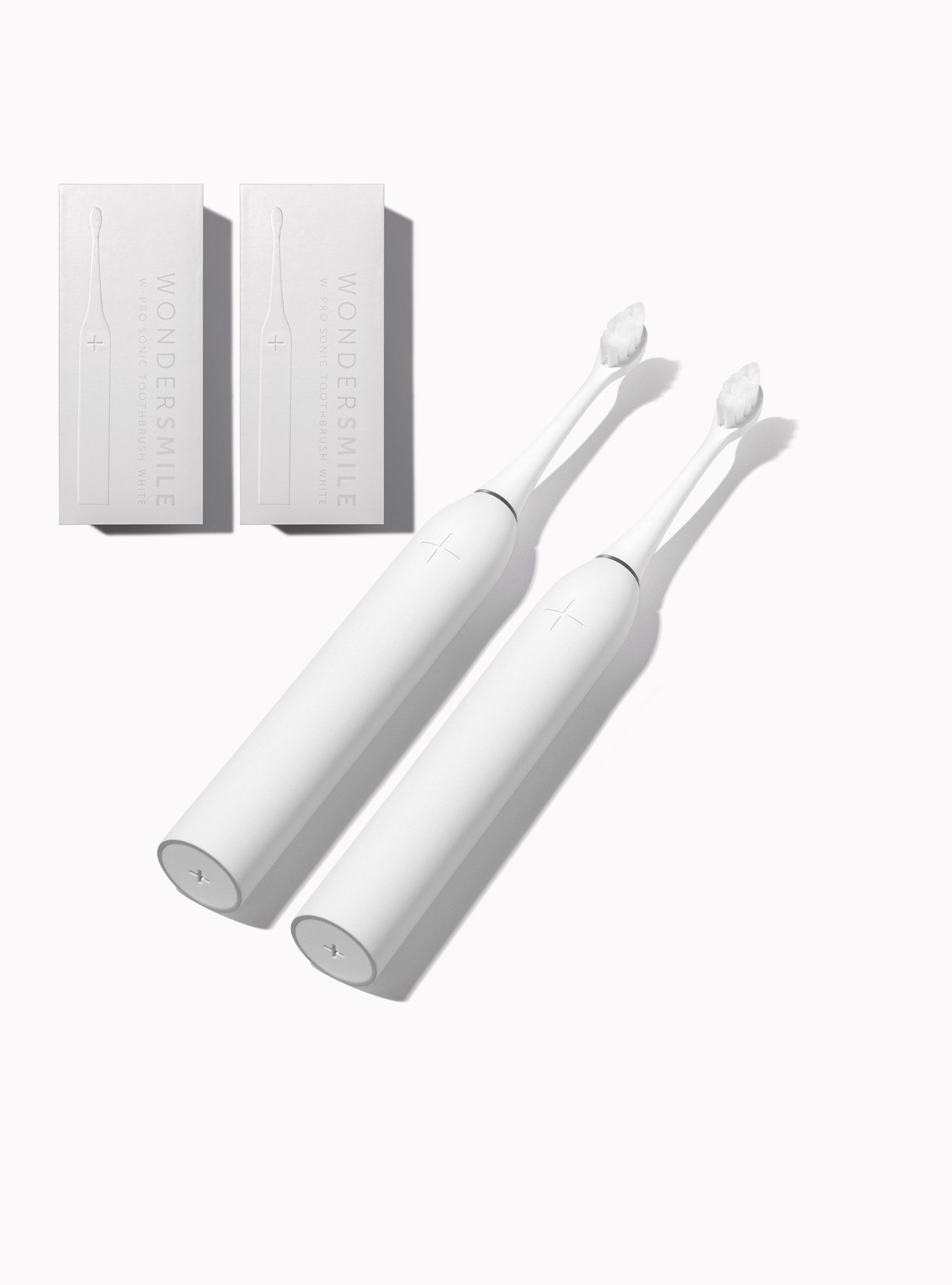 Wondersmile Schallzahnbürste Couple Bundles - Testsieger - 100 Tage risikofrei testen, Aufsteckbürsten: 2 St., Integrierter Zungenreiniger