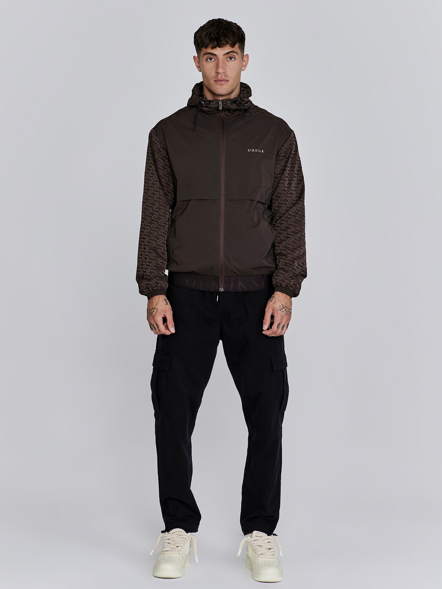 Siksilk Windbreaker SikSilk Herren Braunes AOP Windjacke