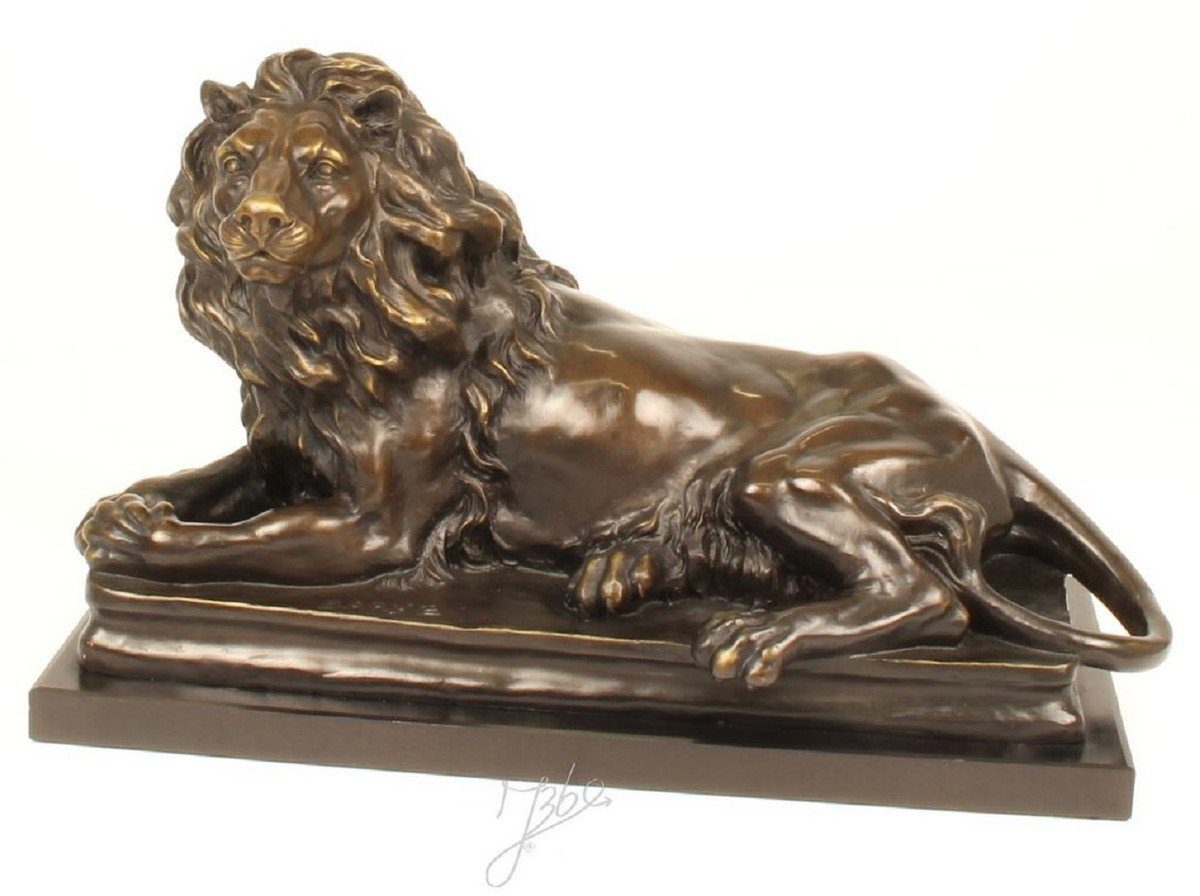 Casa Padrino Dekofigur Luxus Bronzefigur mit Marmorsockel Liegender Nach Links Schauender Löwe Bronze / Grau H. 38 cm - Luxus Qualität