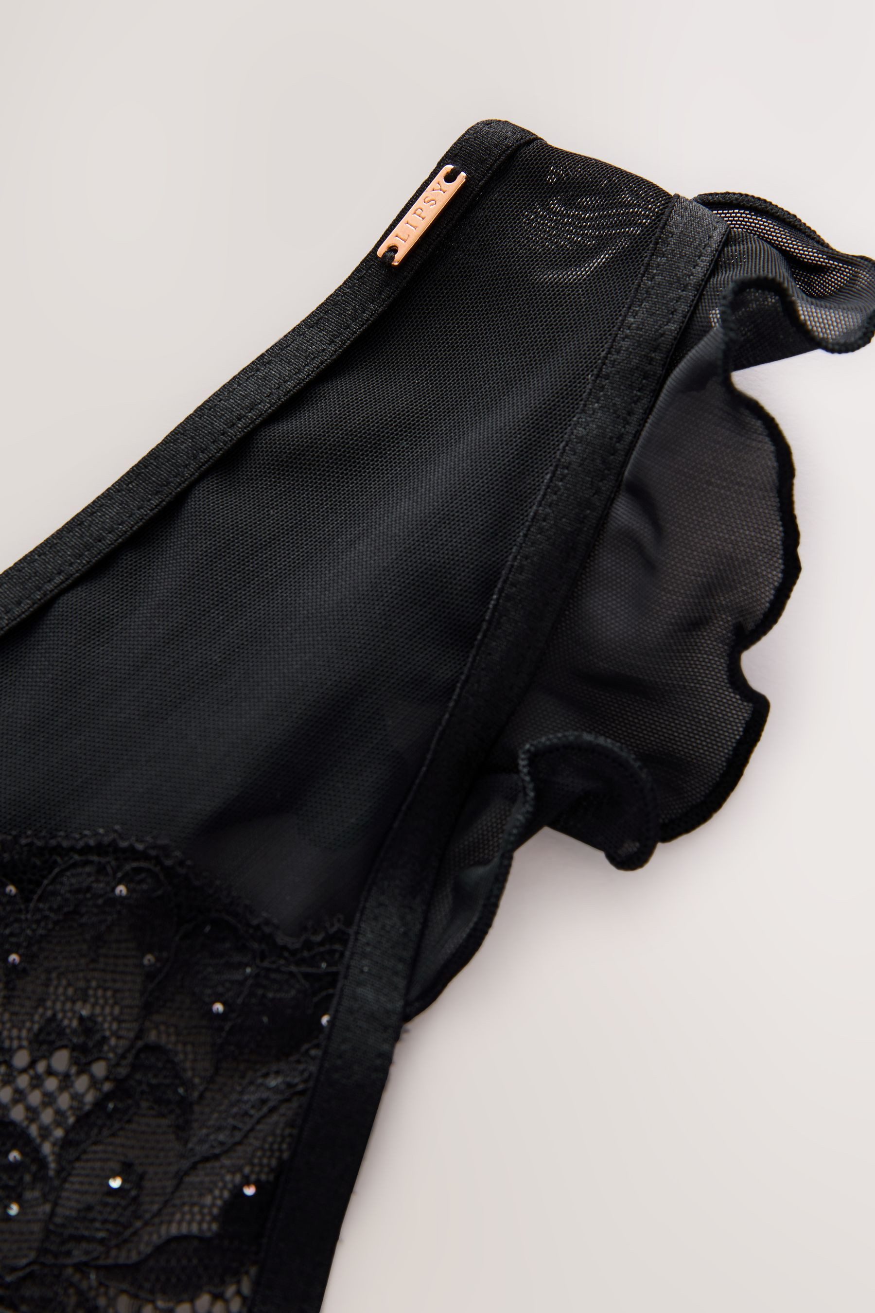 String Lipsy Tanga mit Rüschen und Paillettenbesatz