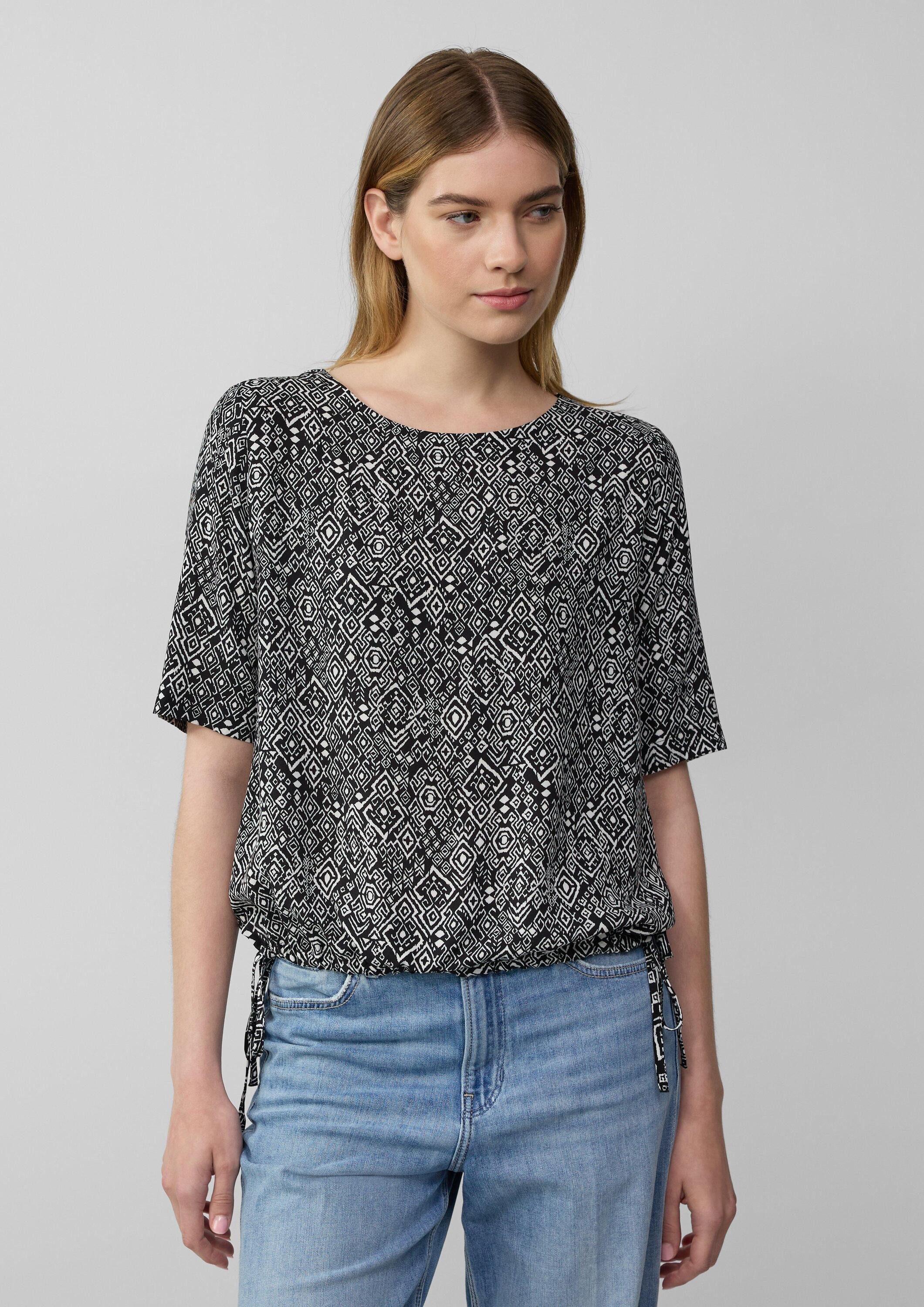 s.Oliver Kurzarmbluse Bluse Gemusterte Shirt-Bluse mit verstellbarem Saum günstig online kaufen