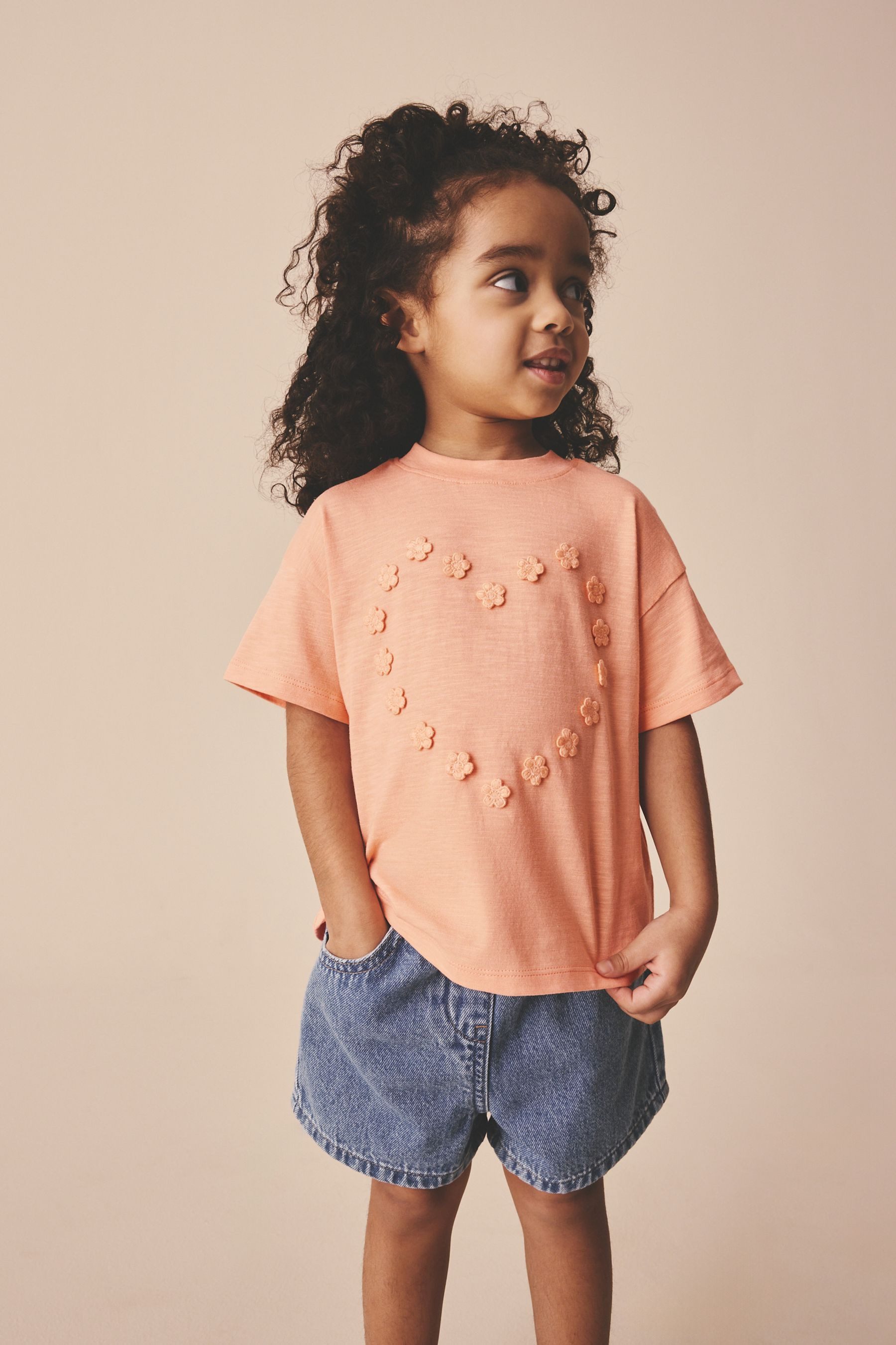 T-Shirt Kurzarm-T-Shirt mit Blumen-Applikation