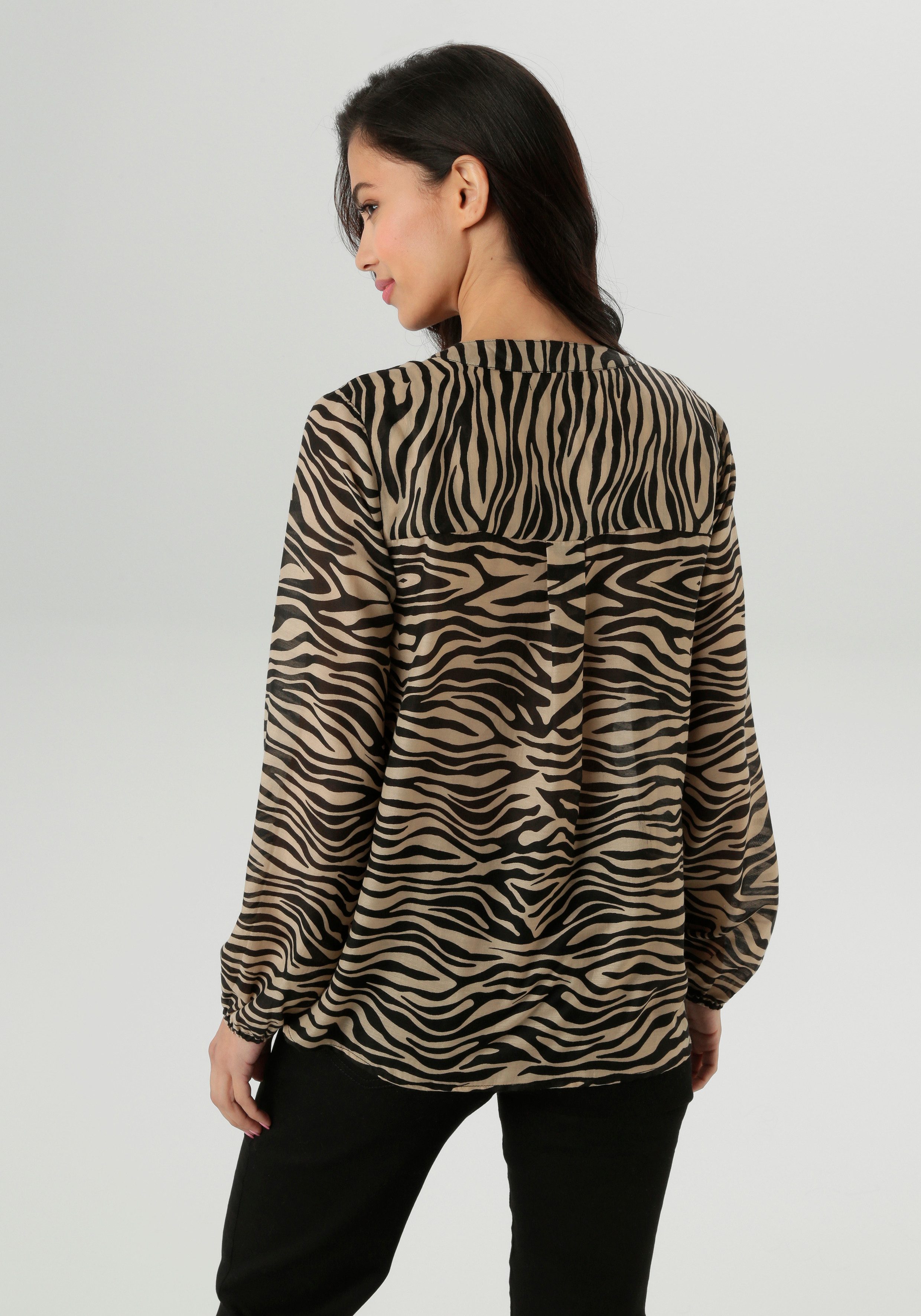 Aniston SELECTED Schlupfbluse mit modischen Animal-Print günstig online kaufen