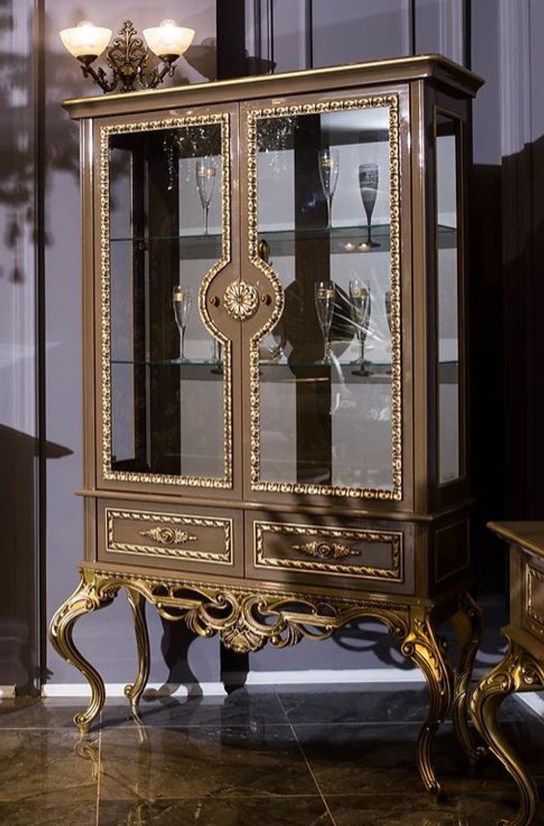Casa Padrino Vitrine Luxus Barock Vitrine Grau / Gold 125 x 43 x H. 193 cm - Edler Massivholz Vitrinenschrank mit 2 Glastüren und 2 Schubladen - Barock Möbel