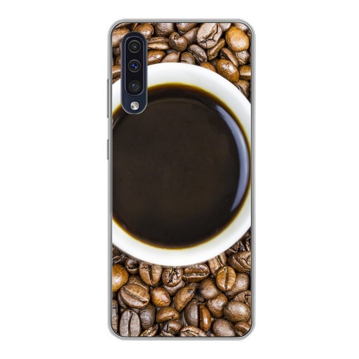 MuchoWow Handyhülle Eine Tasse Kaffee ist von einem Haufen Kaffeebohnen umgeben Handyhülle Samsung Galaxy A30s Smartphone-Bumper Print Handy