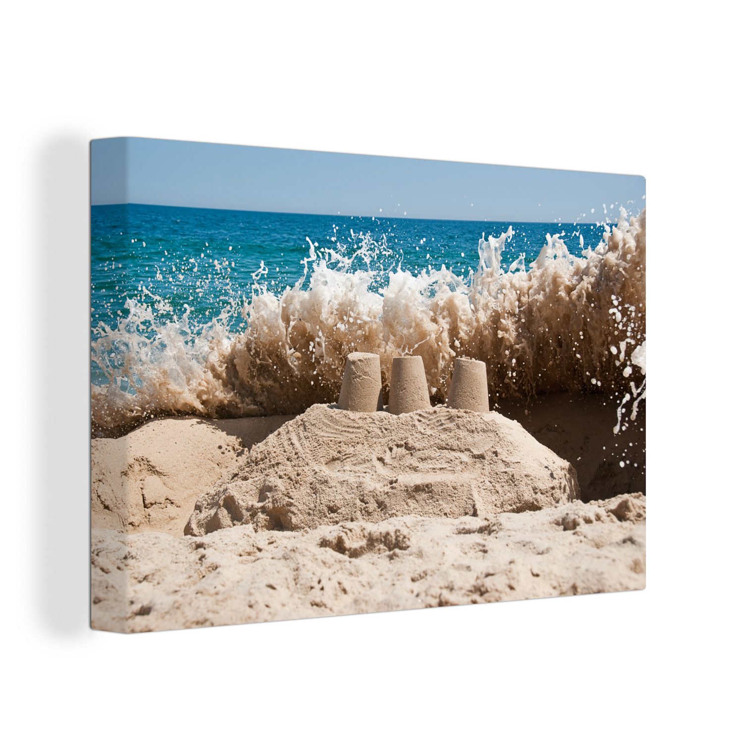 Aufhängefertig, Sandburg die die Wandbild OneMillionCanvasses® Große St), (1 Wanddeko, 30x20 zerstört, cm Leinwandbild Welle, Leinwandbilder,