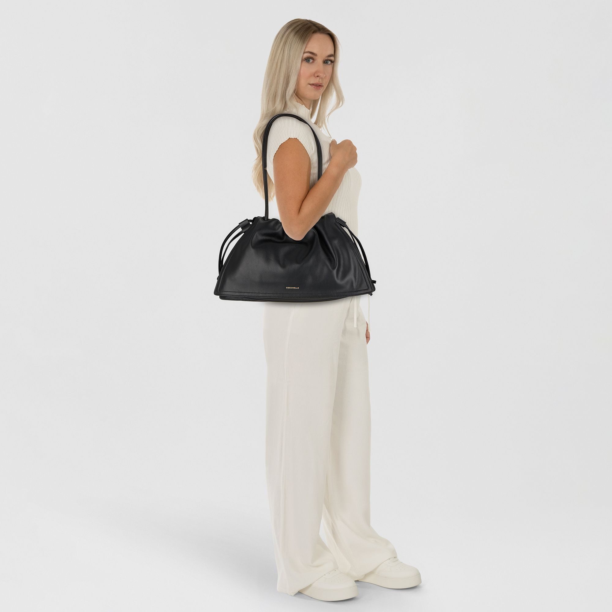 COCCINELLE Beuteltasche Dulse, Leder