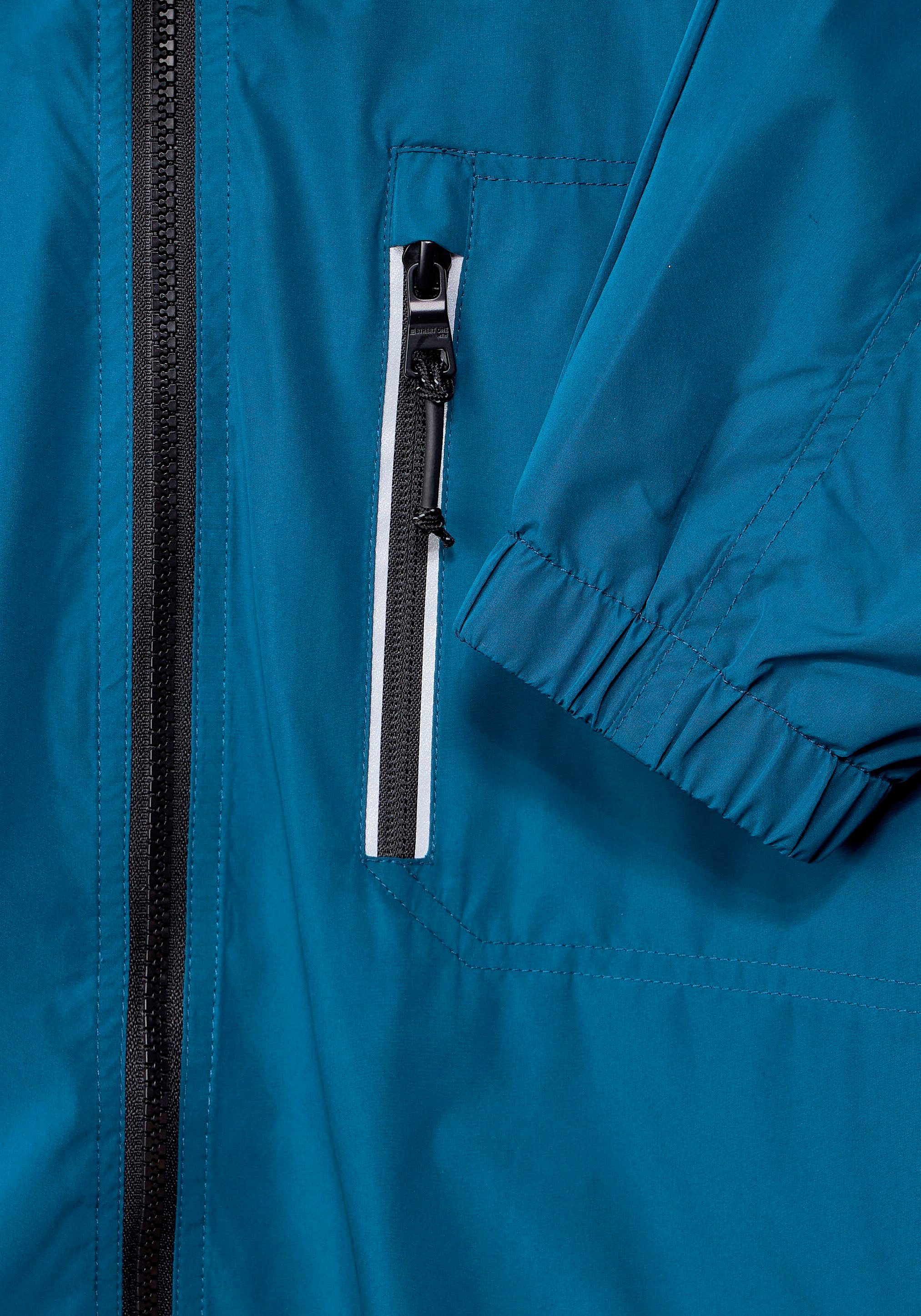 der ONE auf MEN Windbreaker Akzenten pacific reflektierenden mit blue STREET Zipper-Brusttasche