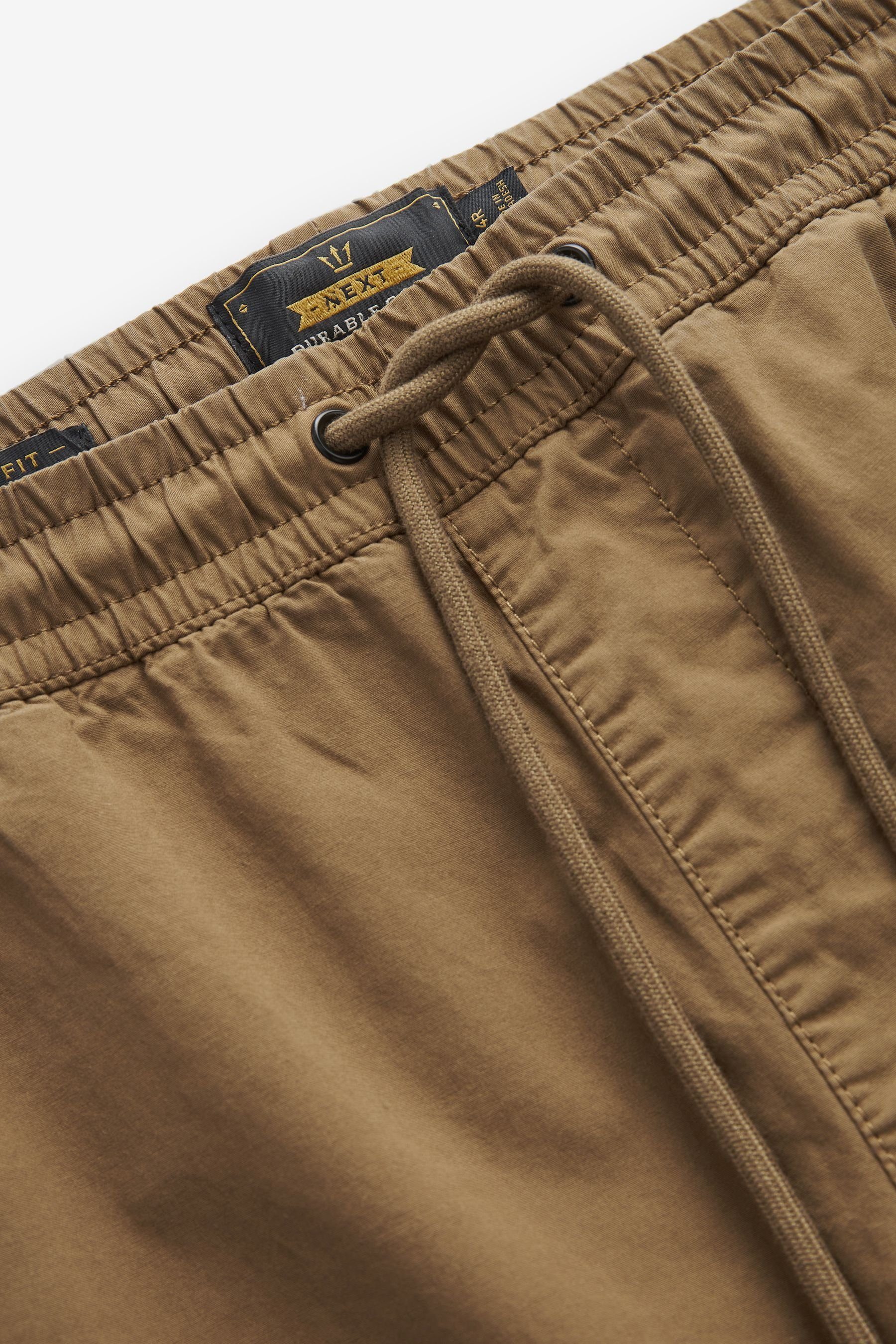 Next Cargohose Utility-Cargohose mit Stretch Regular (1-tlg) Brown Tapered Tan –