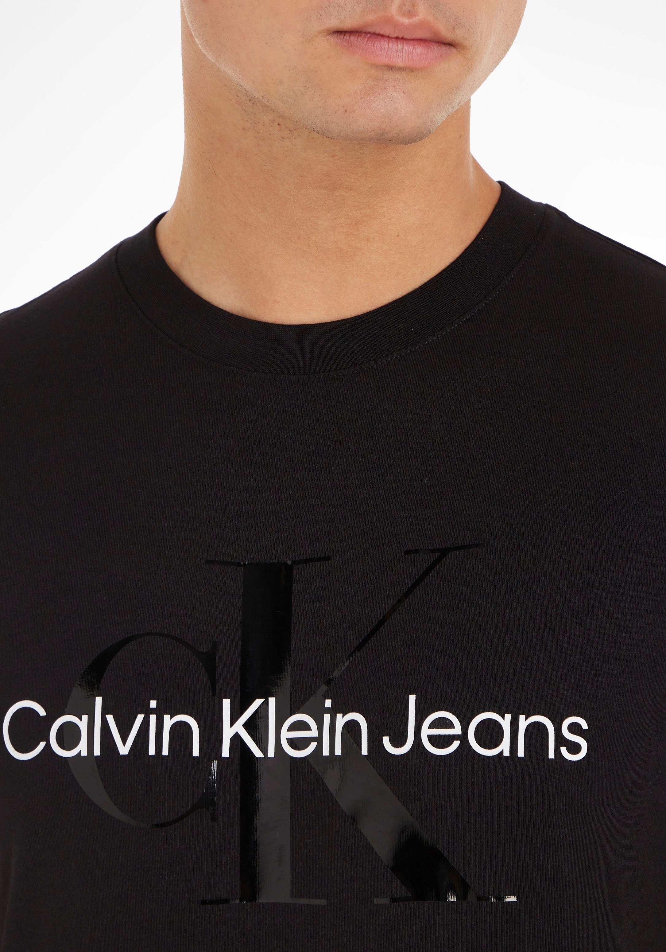 Calvin Klein Jeans T-Shirt Brust mit Black auf SEASONAL Ck Klein Calvin TEE Logoschriftzug der MONOLOGO