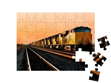 puzzleYOU Puzzle Güterzug im Sonnenuntergang von Arizona, 48 Puzzleteile, puzzleYOU-Kollektionen Lokomotive
