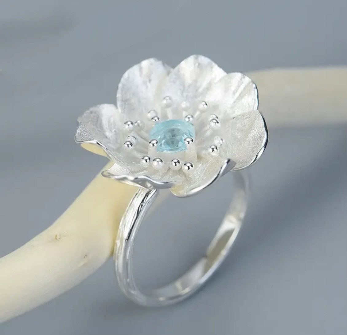 Runde Perlé Silberring Anemone mit Topaz günstig online kaufen