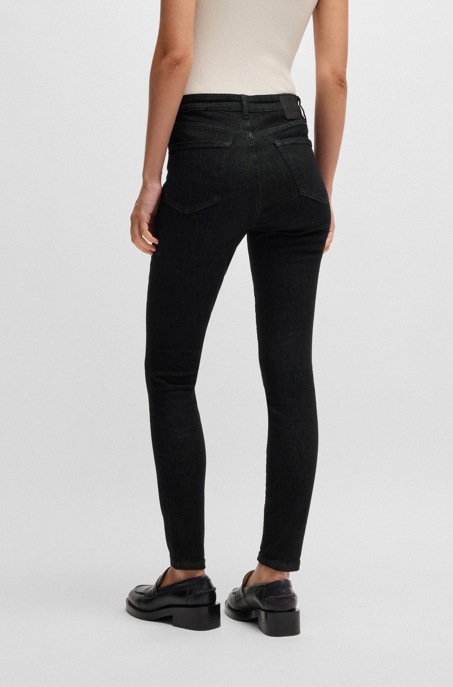 BOSS ORANGE Slim-fit-Jeans Maye High Rise Slim Premium Damenmode mit BOSS Leder-Badge