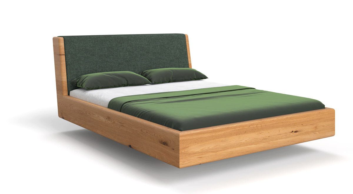 Luxusbetten24 Holzbett Designer Holzbett Cassian, aus massiver Eiche in Schwebeoptik