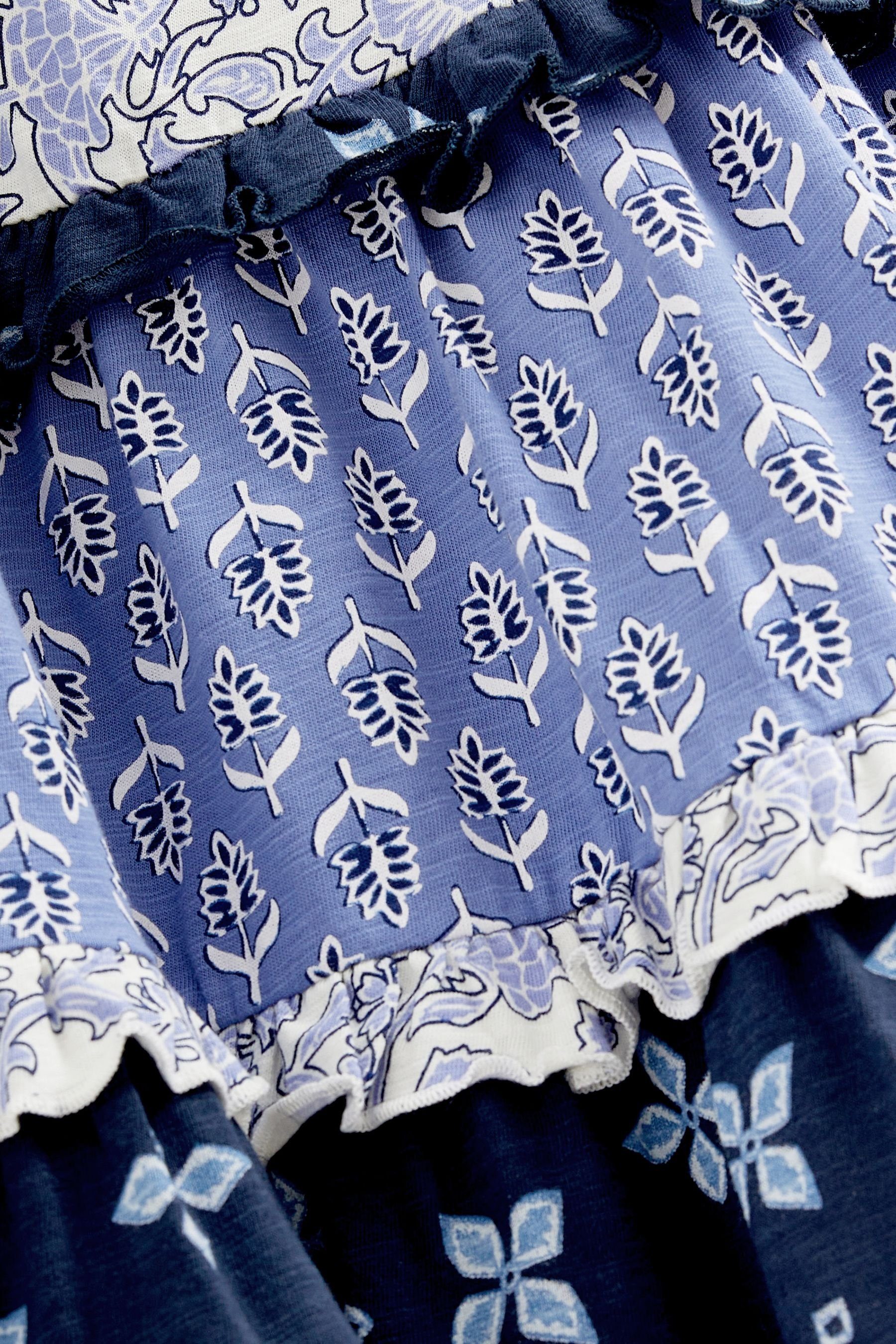 Jersey Midikleid Lochstickerei Next Woodblock aus Midikleid Floral Navy mit Print Mixed Gestuftes (1-tlg) Blue/White