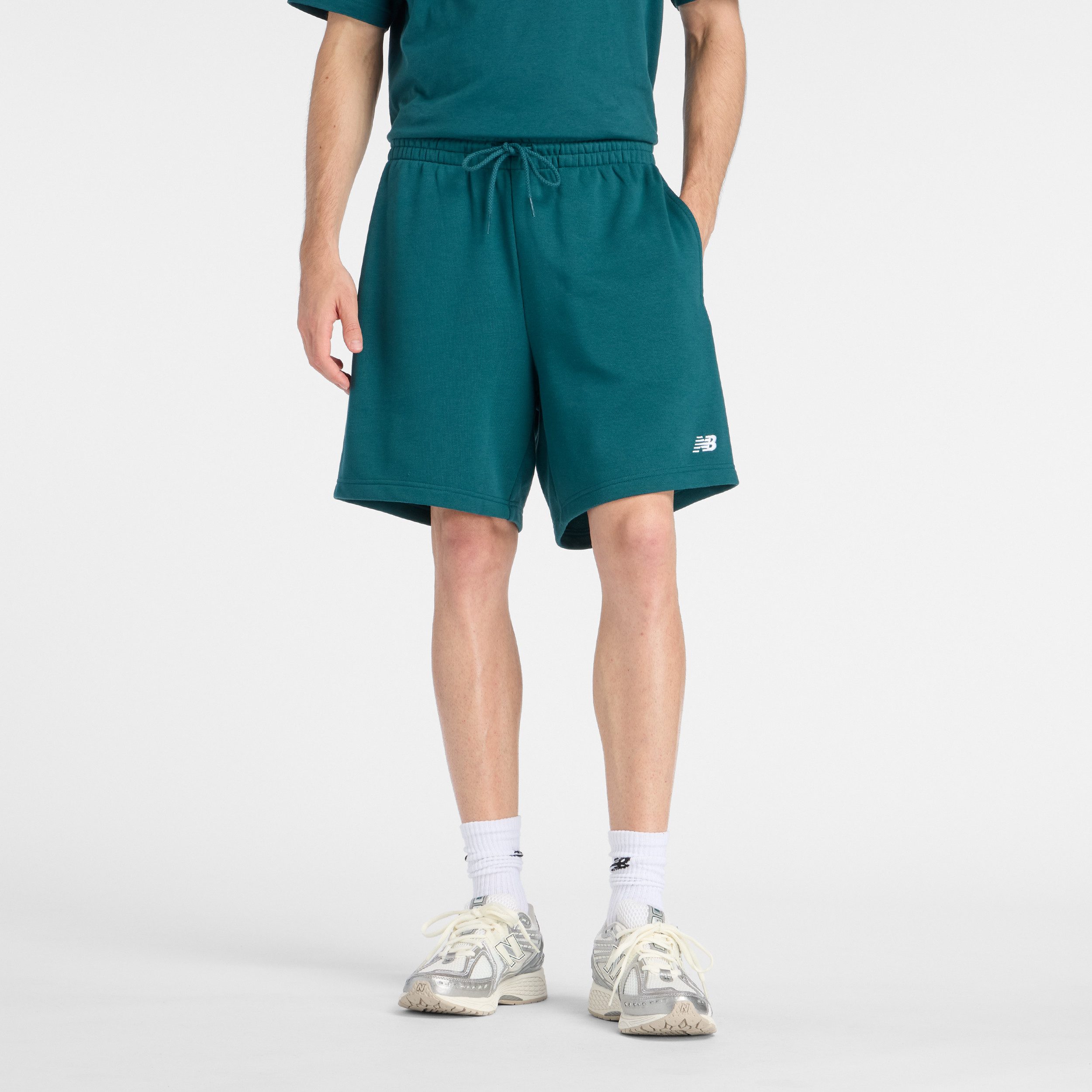 New Balance Sweatshorts Sport Essentials French Terry Short 7" mit Eingrifftaschen und Gesäßtasche, aus weichem French-Terry-Material