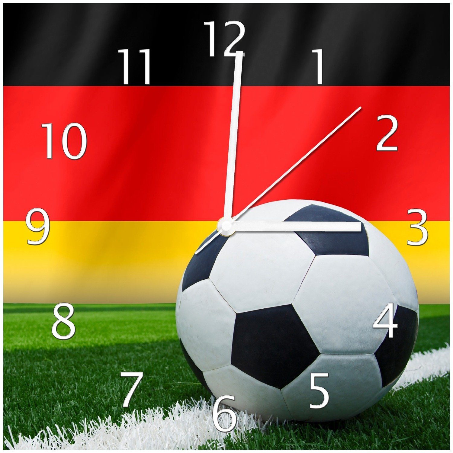 Wallario Wanduhr Fußball vor einer Deutschlandflagge (Glasuhr)