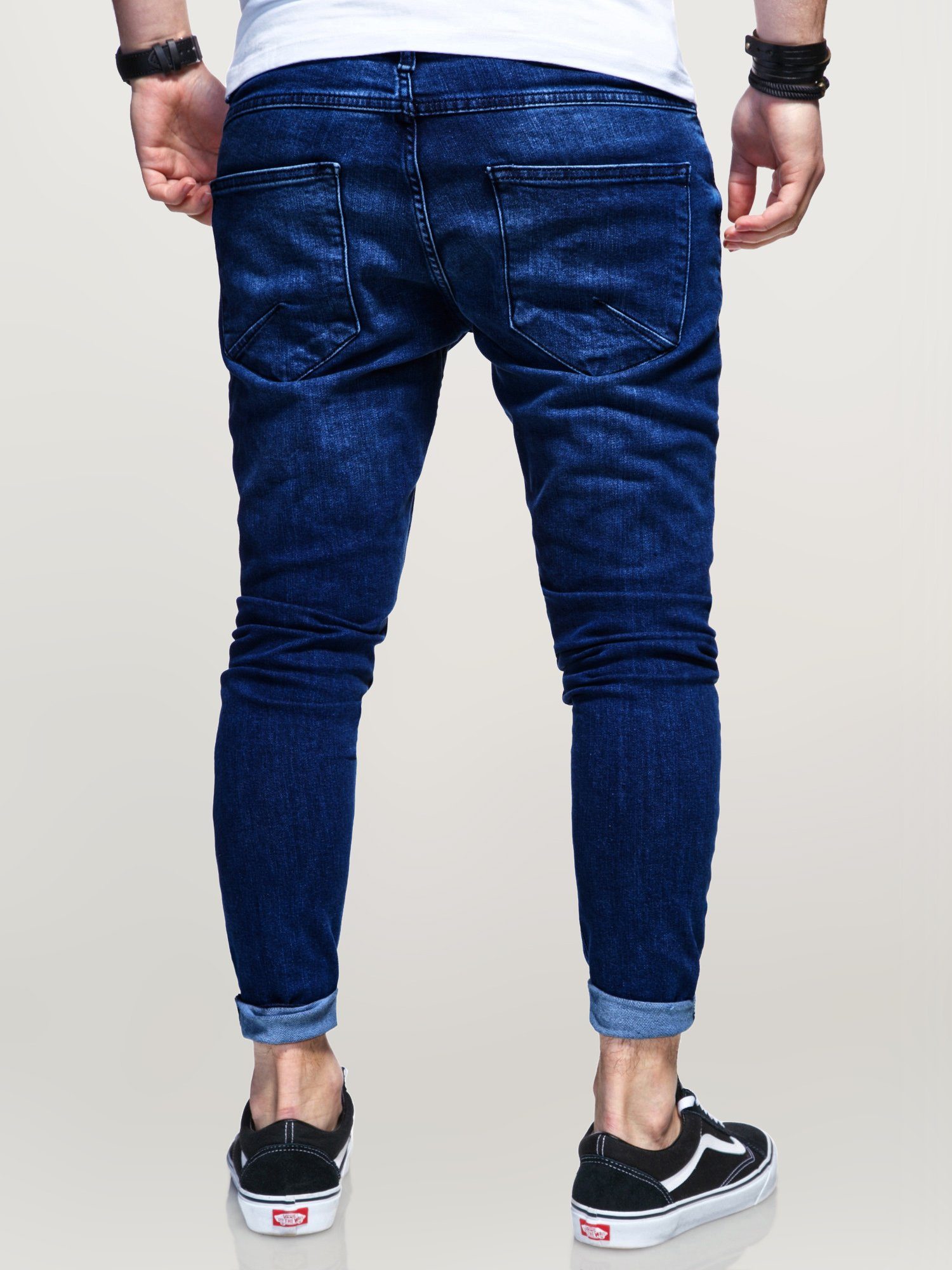 behype Slim-fit-Jeans trendigen EIKE Used-Elementen mit