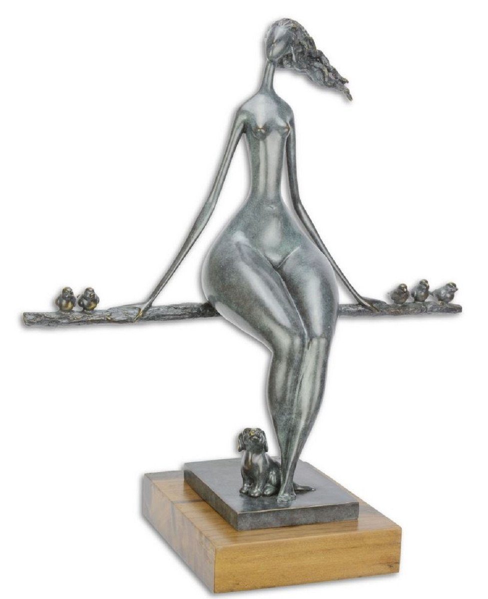 Casa Padrino Dekofigur Designer Bronzefigur entspannende Frau Blau / Gold / Naturfarben 52,2 x 23,8 x H. 55,6 cm - Luxus Deko Bronze Skulptur mit Holzsockel