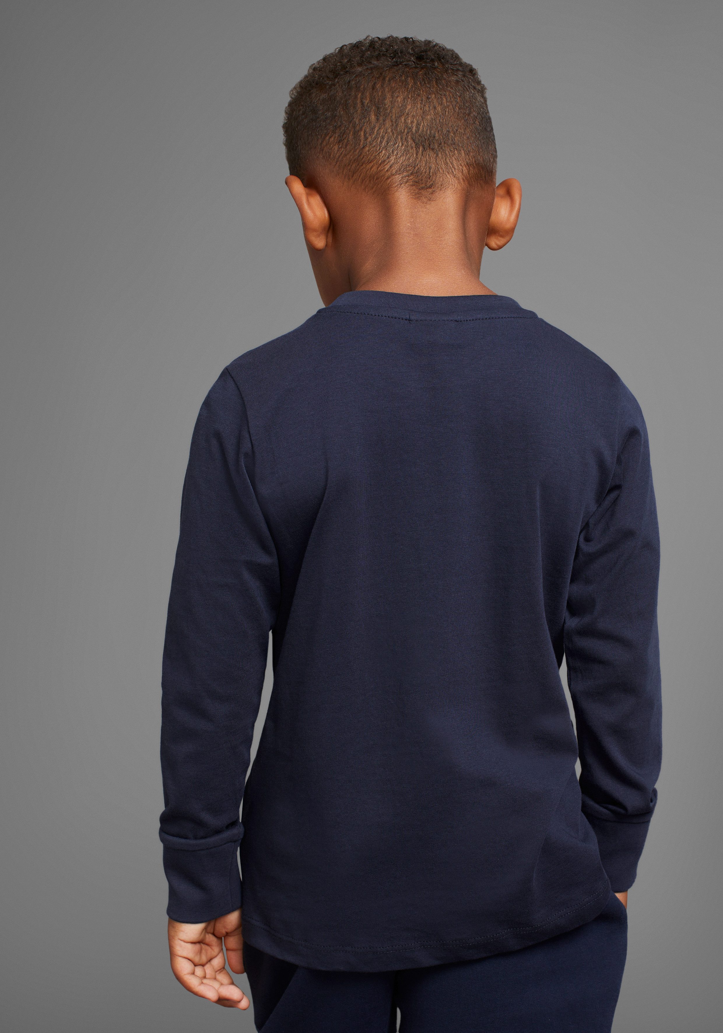 KIDSWORLD Langarmshirt HIER KOMMT RETTUNG Langarm, Basic-Passform, peppiger Druck