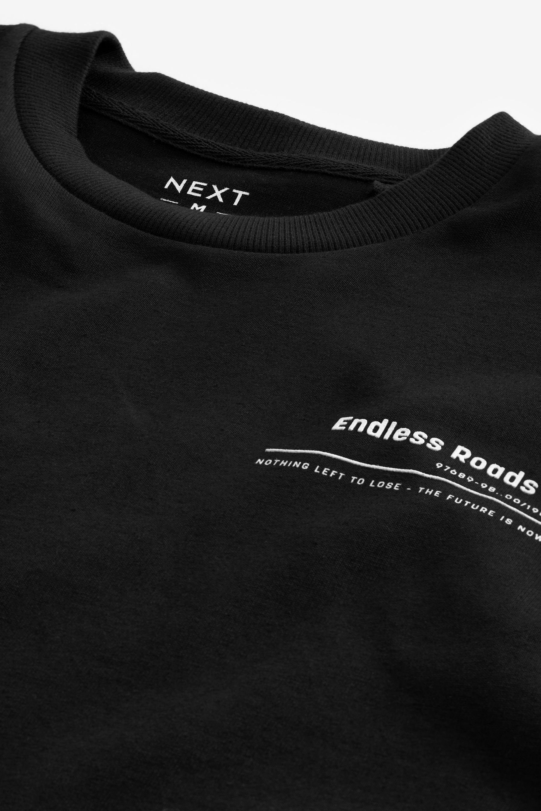 Next Langarmshirt Grafik-Shirt mit langen und Black (1-tlg) Rückenprint Ärmeln