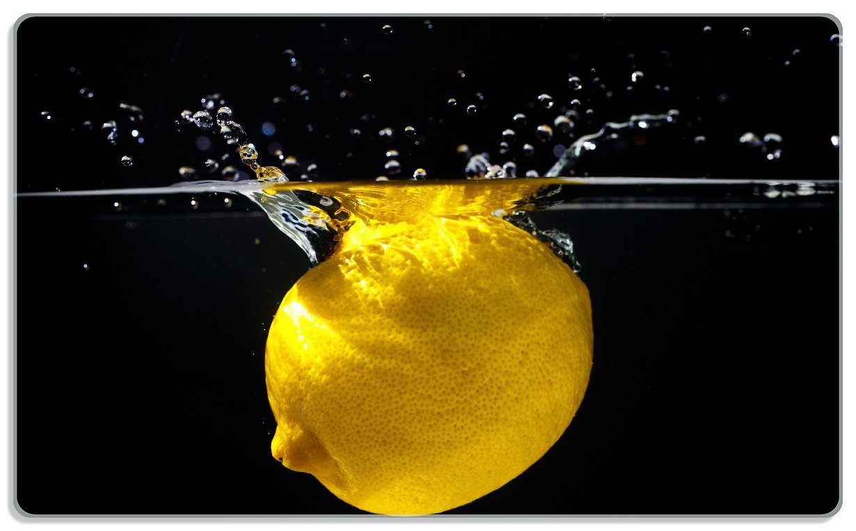 Wallario Frühstücksbrett Zitrone im Wasser - Frisches Obst für die Küche, ESG-Sicherheitsglas, (inkl. rutschfester Gummifüße 4mm, 1-St), 14x23cm | Frühstücksbrettchen