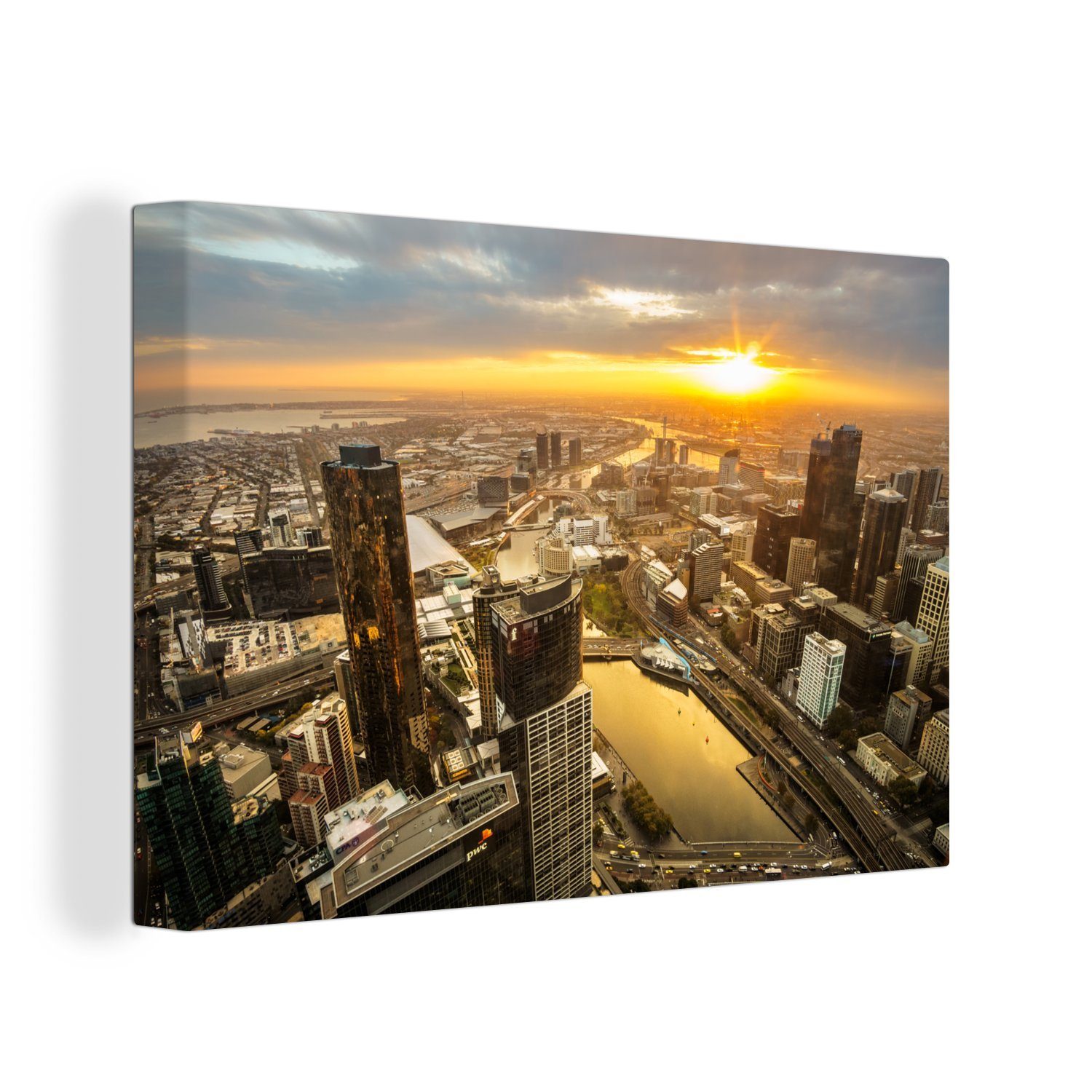 Wanddeko, (1 Sonne Wandbild Strahlen OneMillionCanvasses® über Die Stadt die Leinwandbild wirft 30x20 untergehende St), Melbourne, Leinwandbilder, Aufhängefertig, goldene cm