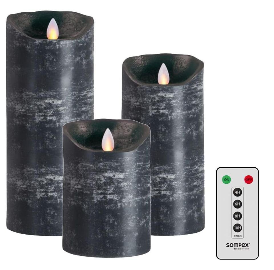 SOMPEX LED-Kerze »3er Set Flame LED Kerzen anthrazit 12,5/18/23cm« (Set,  4-tlg., 3 Kerzen, Höhe 12,5/18/23cm (je 8cm Durchmesser), 1 Fernbedienung),  fernbedienbar, integrierter Timer, Echtwachs, täuschend echtes Kerzenlicht