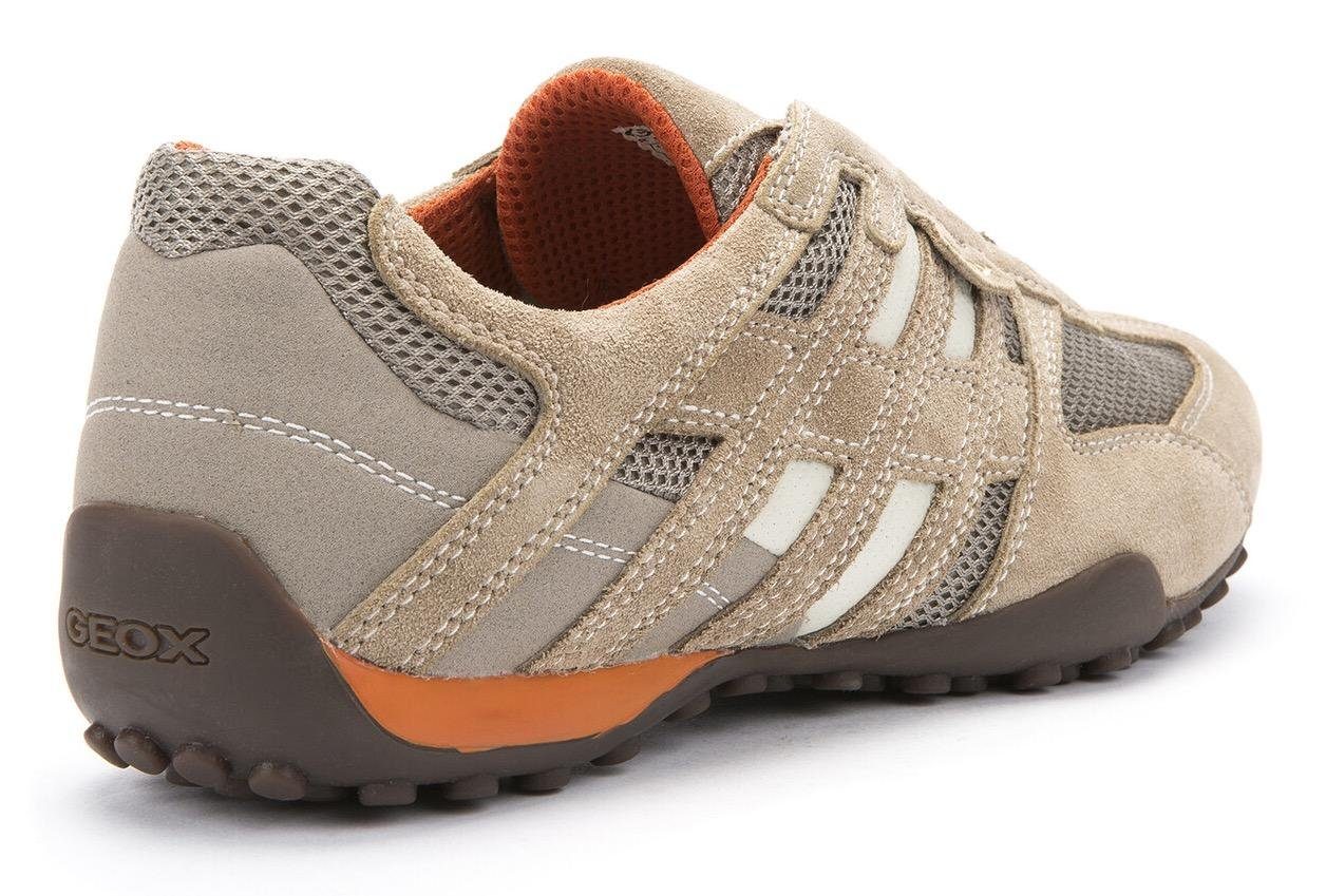 Membrane mit mit und Geox modischen beige-orange Sneaker Slip-On Spezial UOMO SNAKE Ziernähten Geox