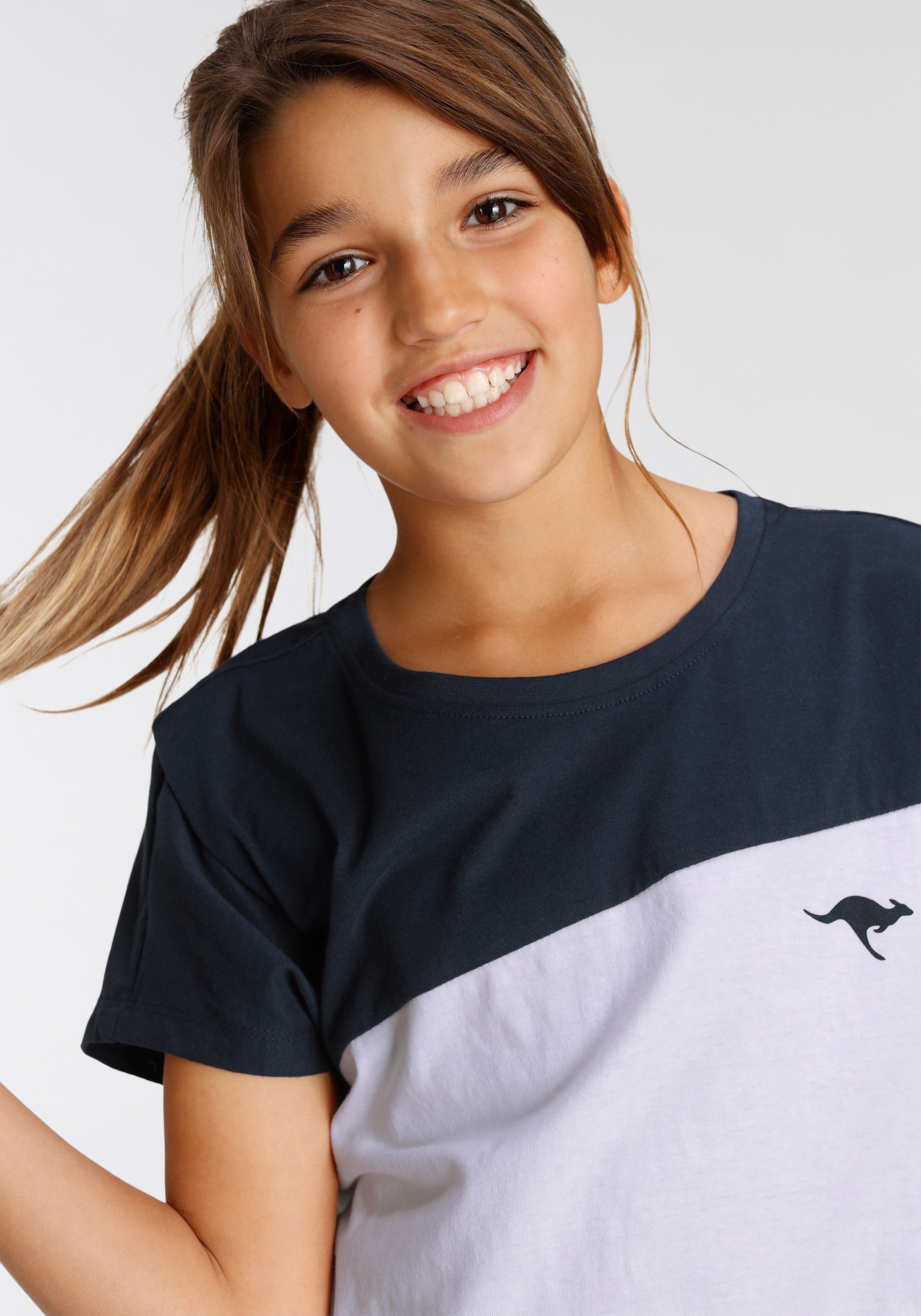 KangaROOS Fledermausshirt kurzärmelig, weit geschnitten, mit peppigem Druck