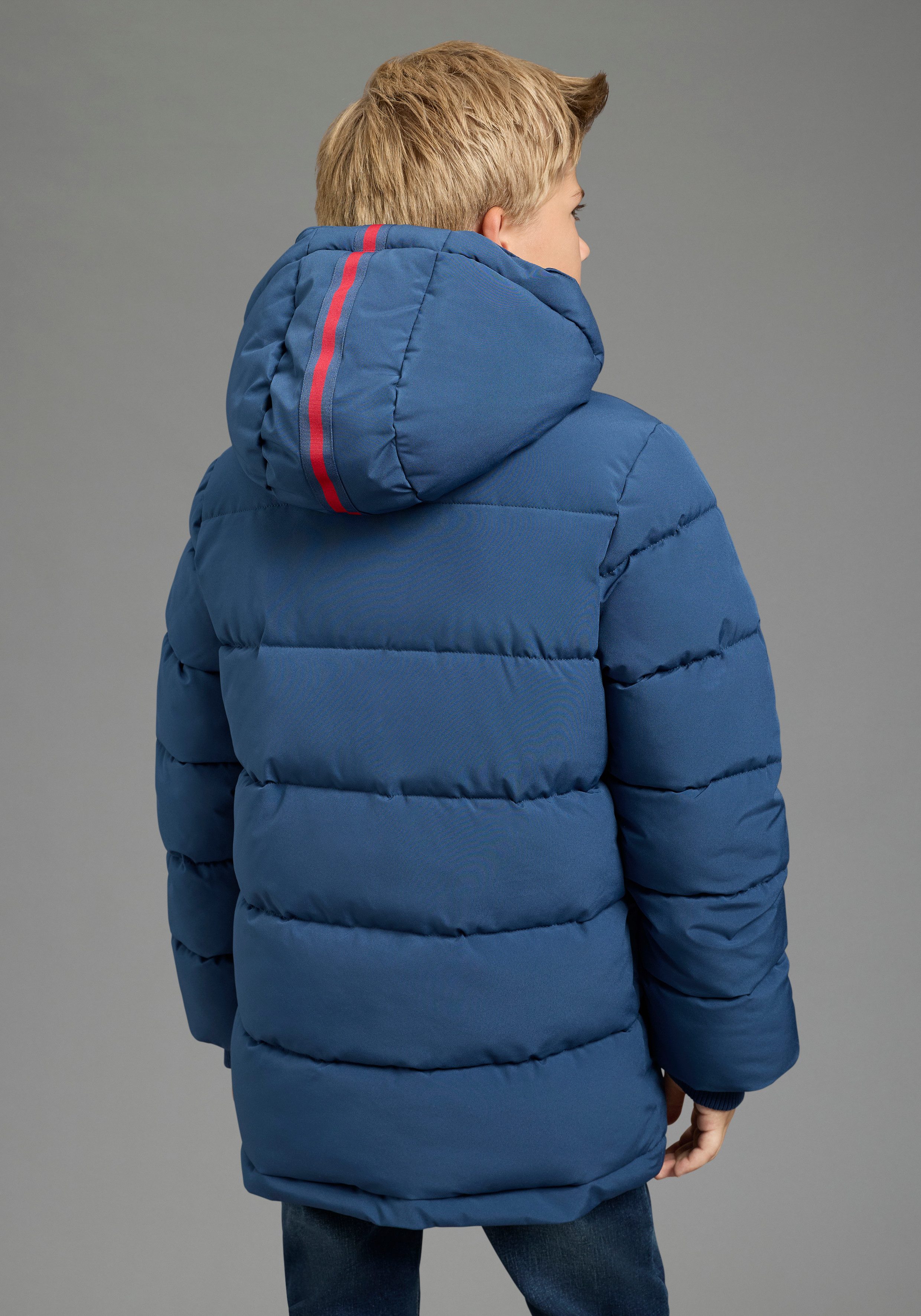 KIDSWORLD Outdoorjacke Winterwarme Jacke, gesteppt Trendige Winterjacke mit refklektierenden Details – Bild 2 von 5