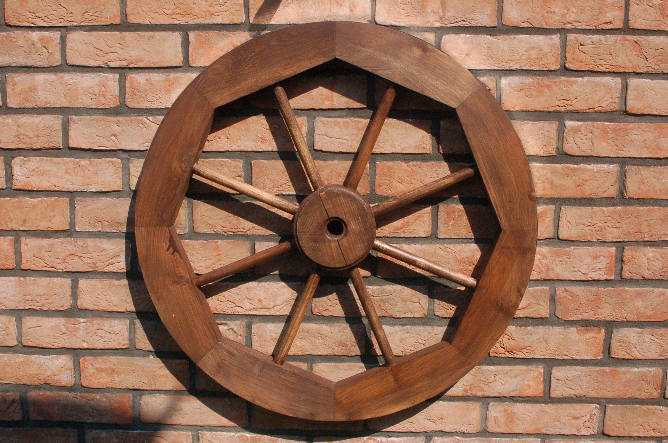 Gartenfigur Wagenrad