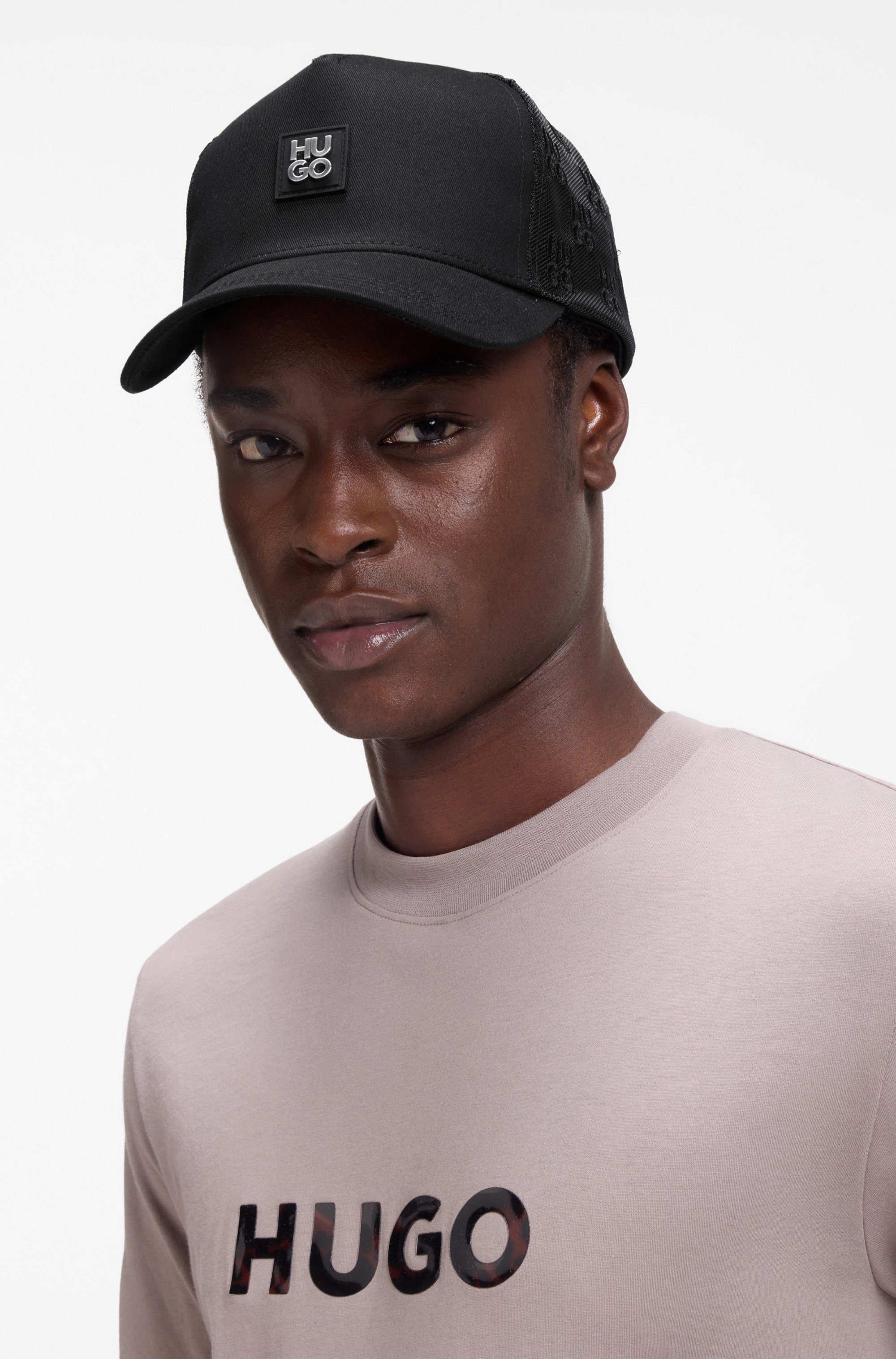 HUGO Baseball Cap Marsel Trucker SL mit Allover-Logostickerei