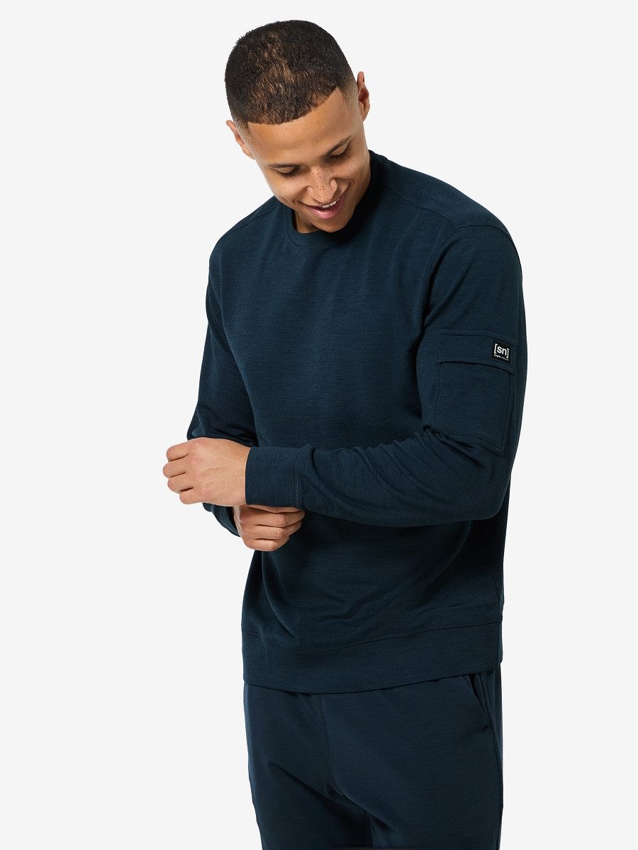 SUPER.NATURAL Sweatshirt für Herren, Merino M ALPINE BRUSH CREWNECK mit Winter-Motiv, atmungsaktiv