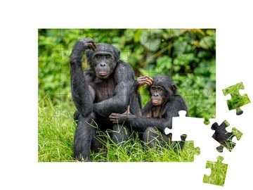 puzzleYOU Puzzle Weiblicher Bonobo mit einem Baby, Kongo, Afrika, 48 Puzzleteile, puzzleYOU-Kollektionen Affen, Tiere in Dschungel & Regenwald