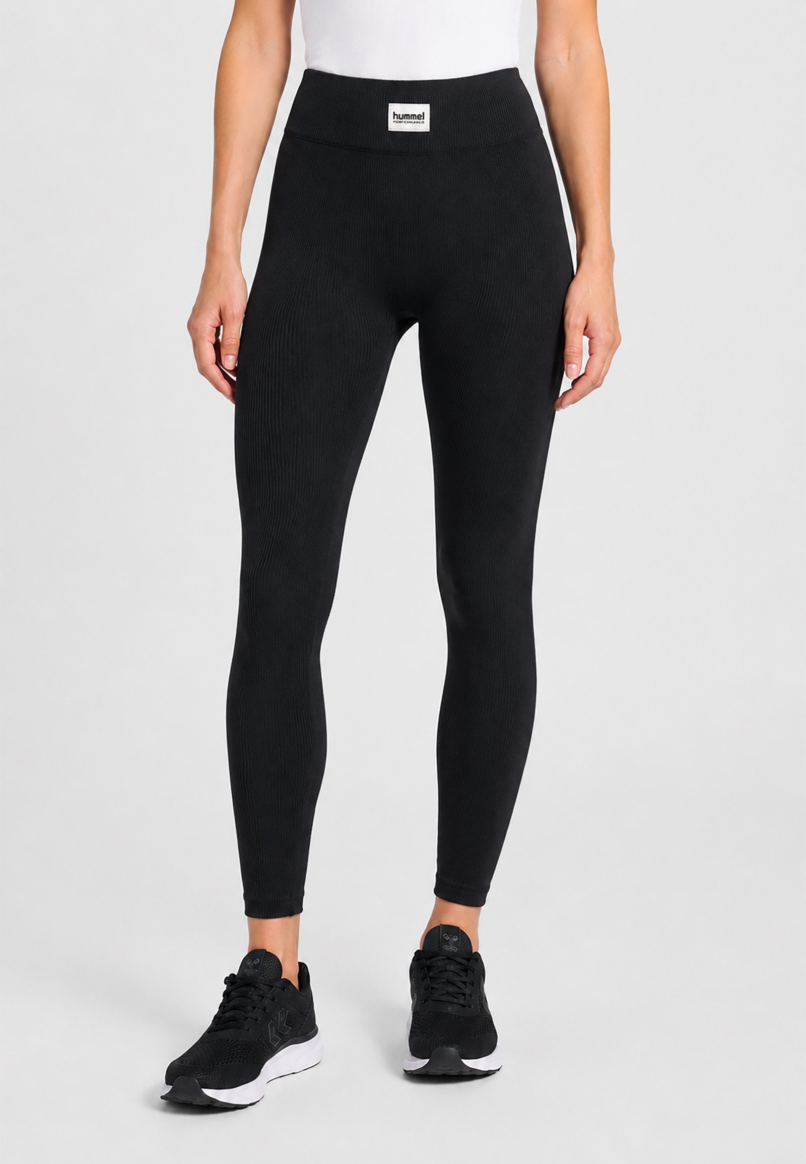 hummel Leggings Logo Patch Elastikbund Körpernah Rippstruktur Sportlich für Damen (1-tlg) Slim Fit Einfarbig elastisch Ohne Verschluss Casual-Style