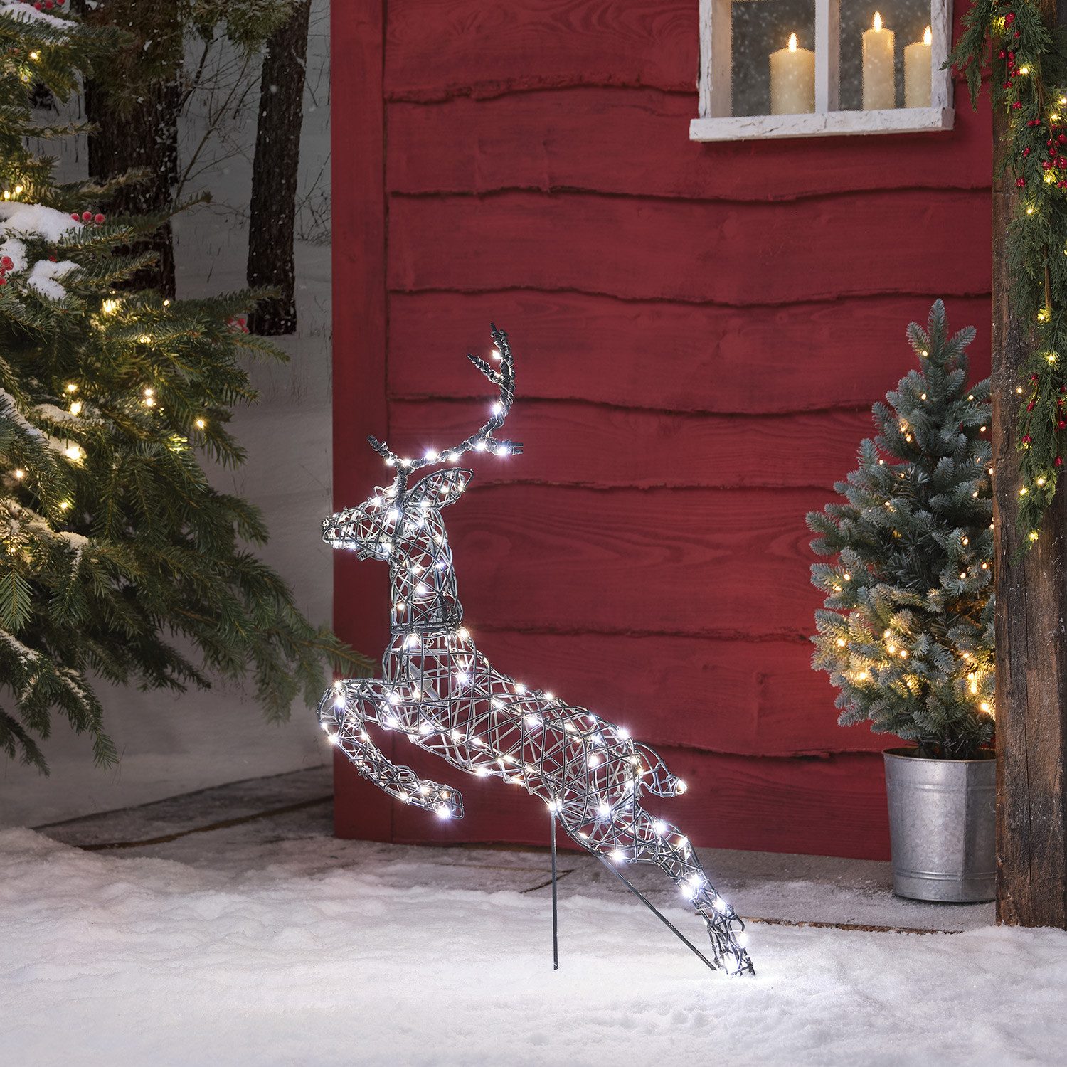 Lights4fun LED-Dekofigur Springendes LED-Rentier Hirsch M Harlow