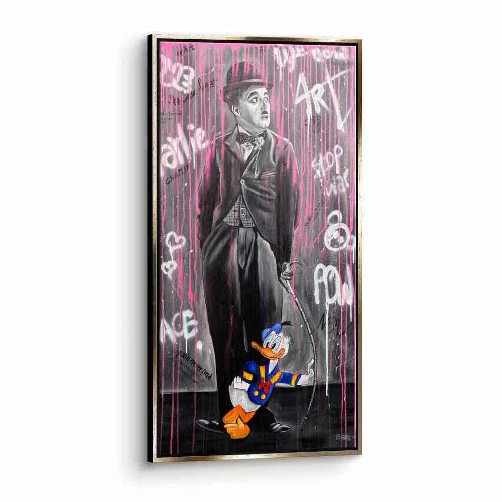 DOTCOMCANVAS® Leinwandbild, Leinwandbild Charlie mit premium Donald schwarzer Rahmen Pop Duck Rahmen Chaplin Art