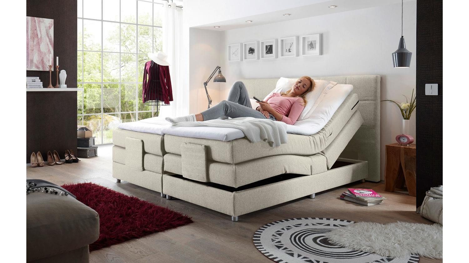 Bega Consult Boxspringbett Boxspringbett Manolo 2 in Stoff creme mit Motor 180x200 cm